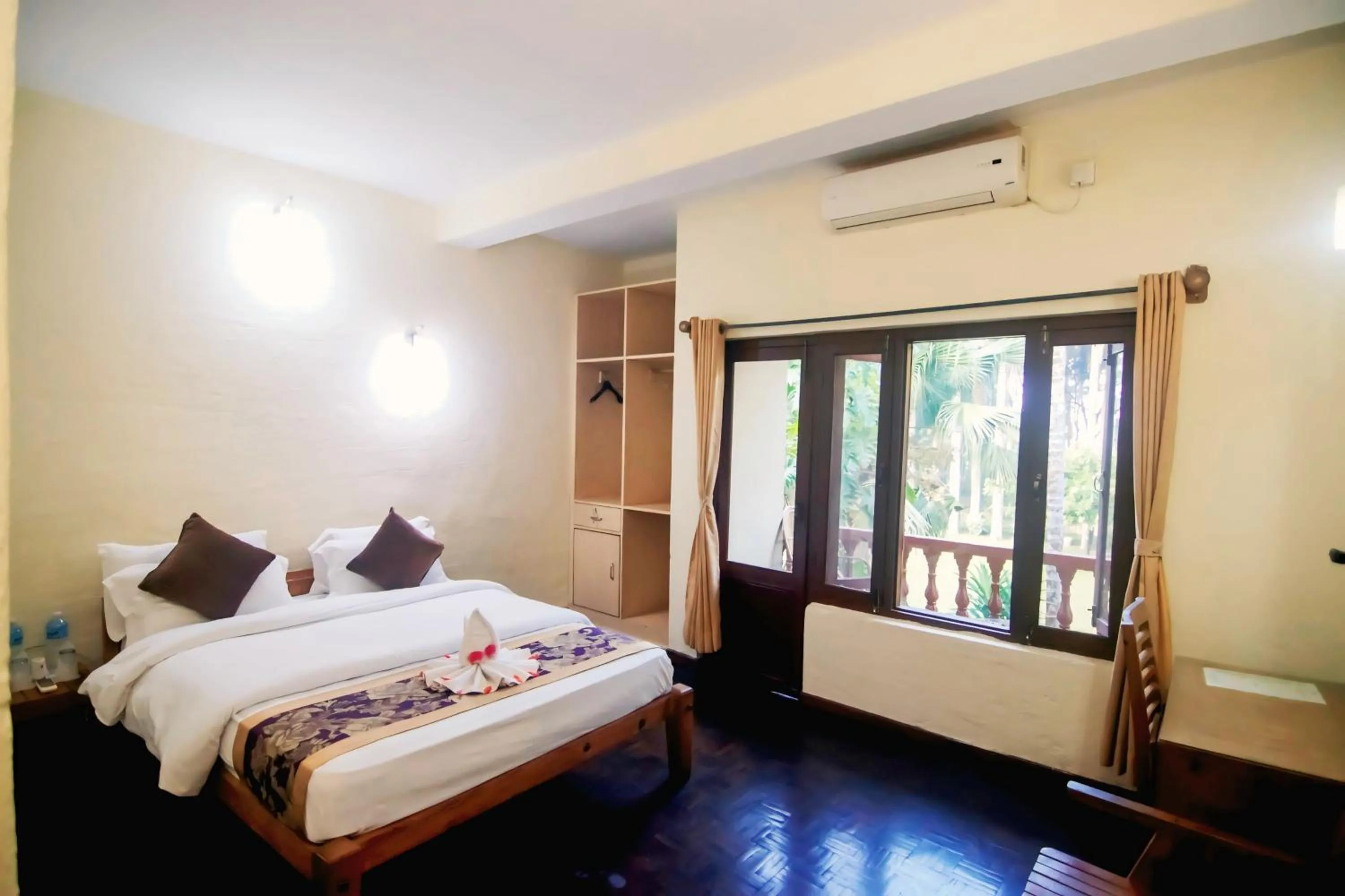 Bedroom, Bed in Chitwan Paradise Hotel