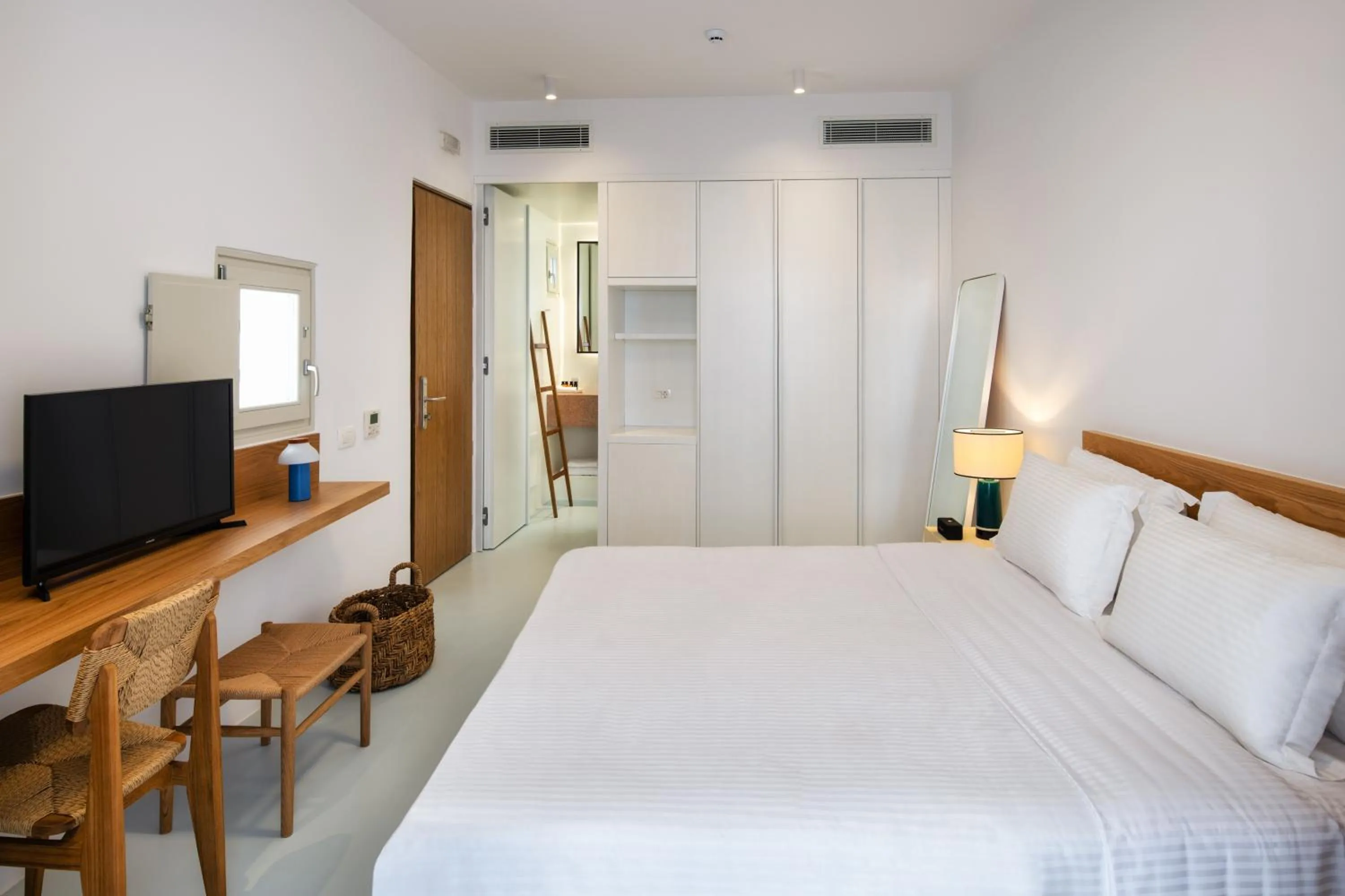 Bed in Viva Nove Suites