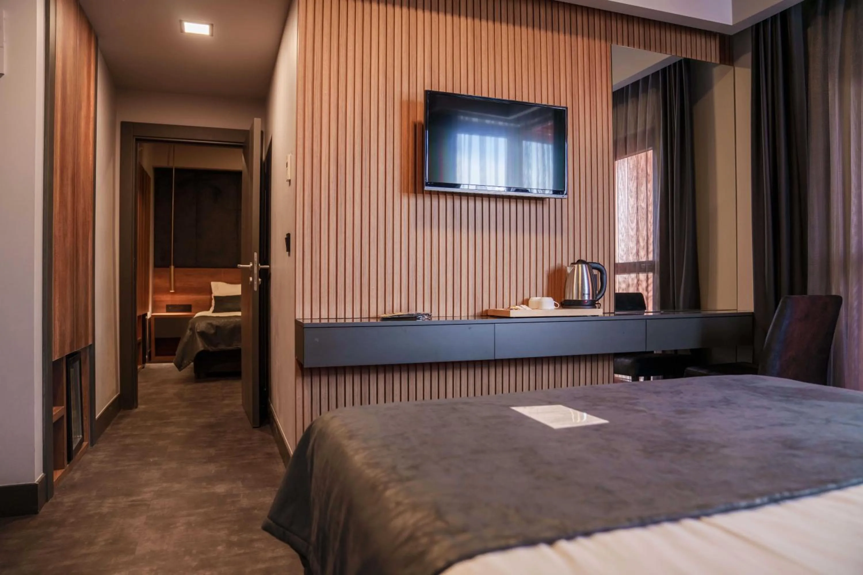 Bed in SennaCity Hotel