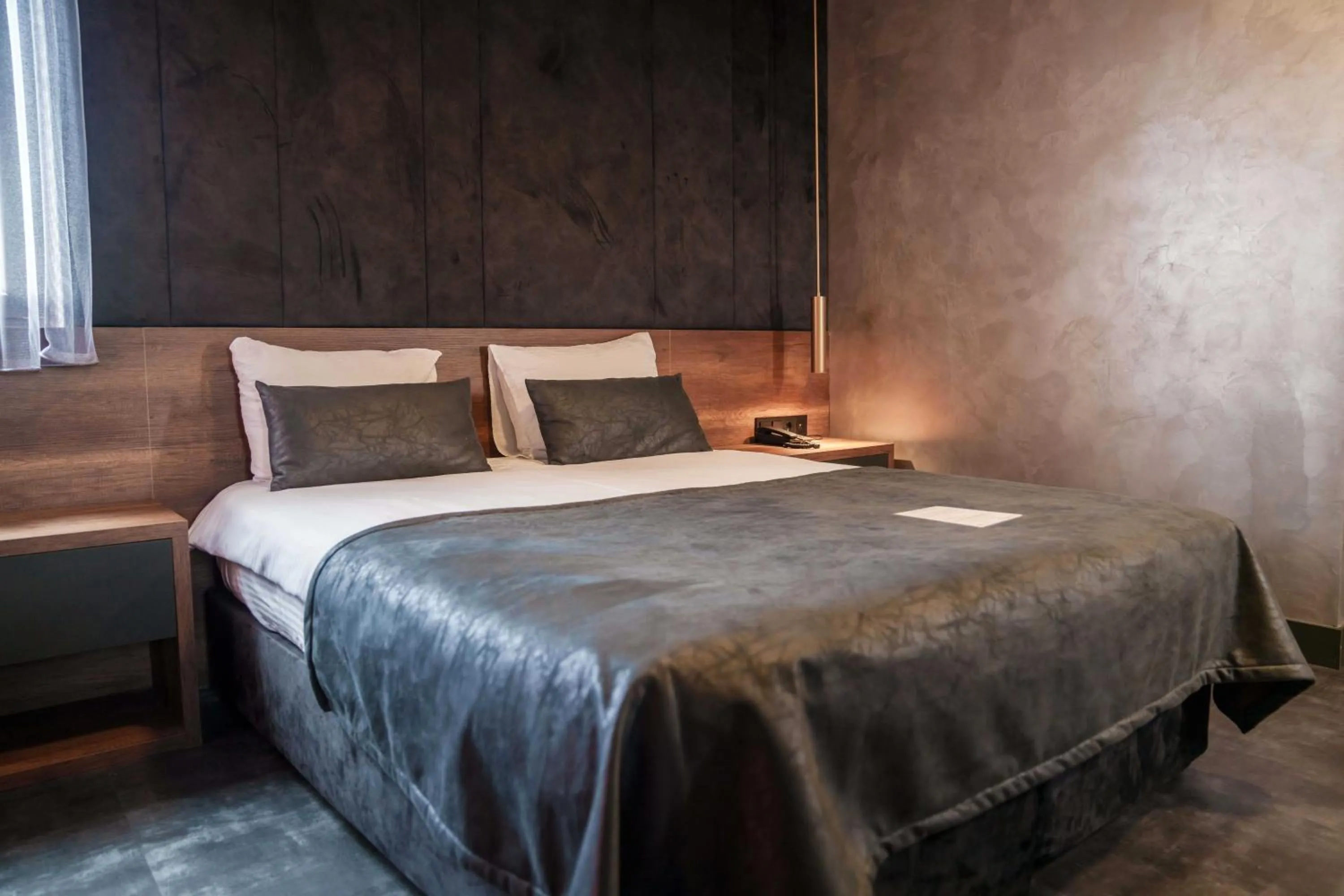 Bed in SennaCity Hotel