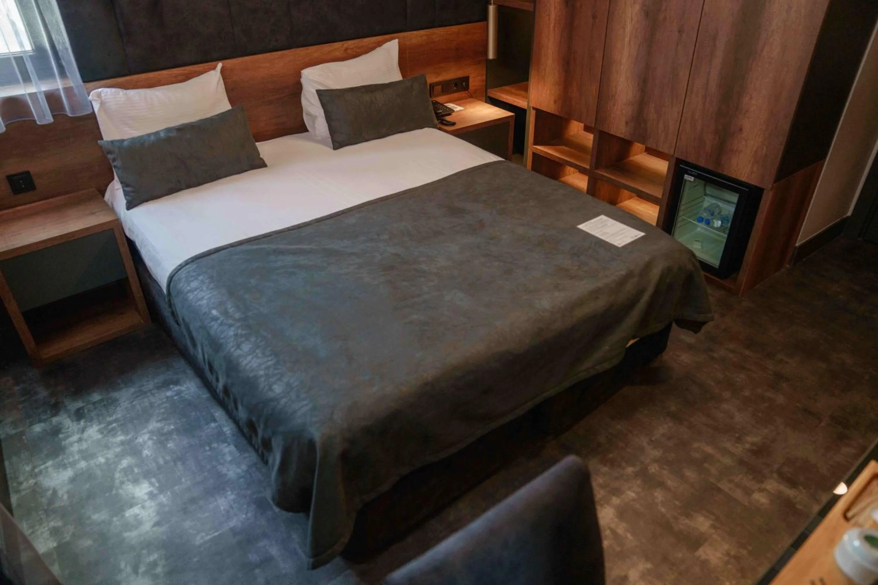 Bed in SennaCity Hotel