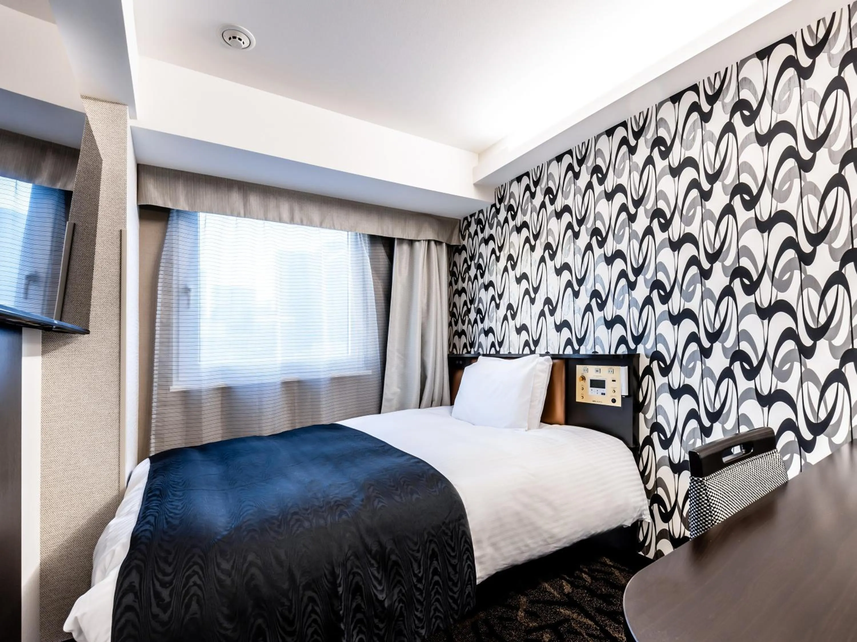 Photo of the whole room, Bed in APA Hotel Kayabacho Hachobori Ekimae