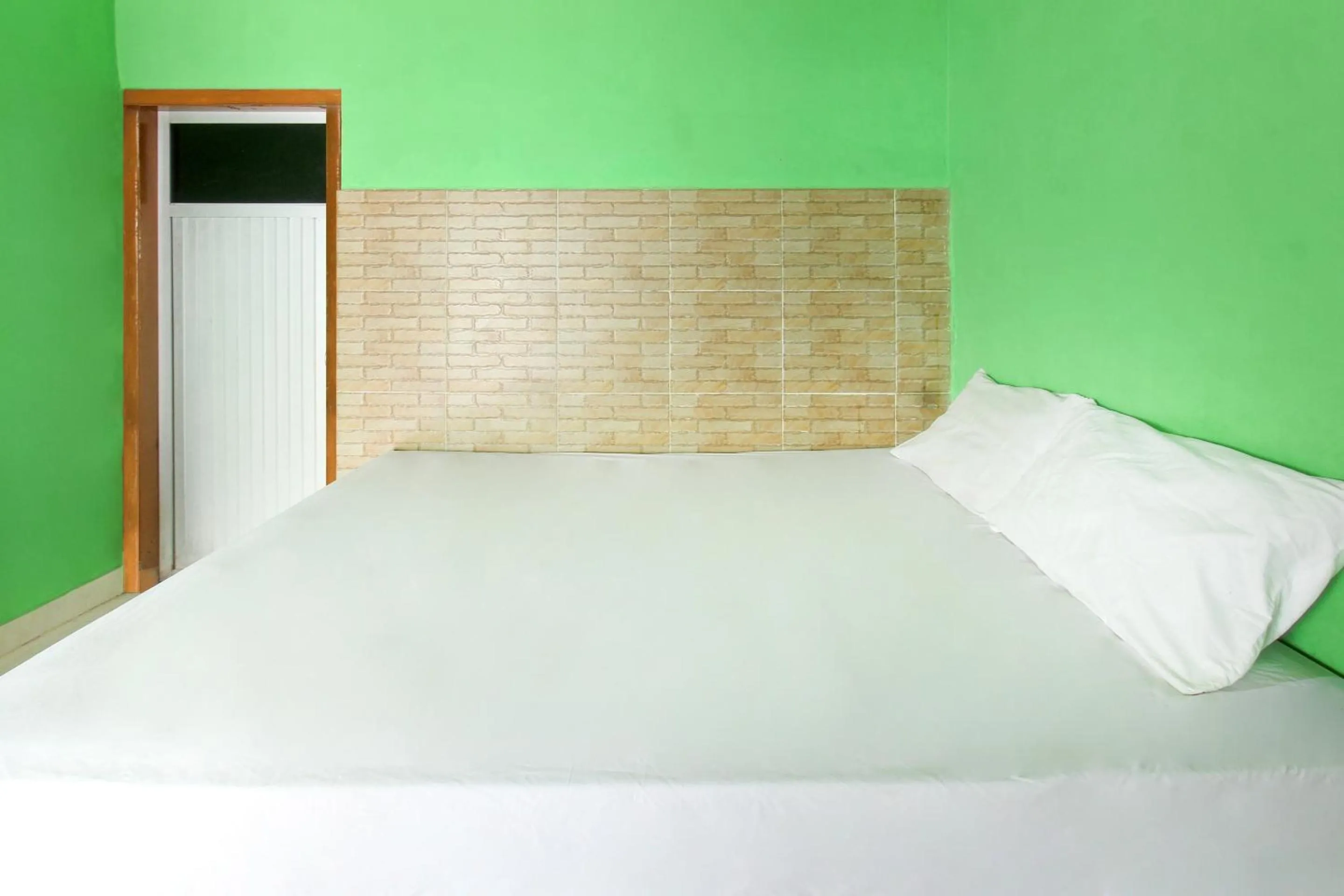 Bedroom in Hotel O Jayanni