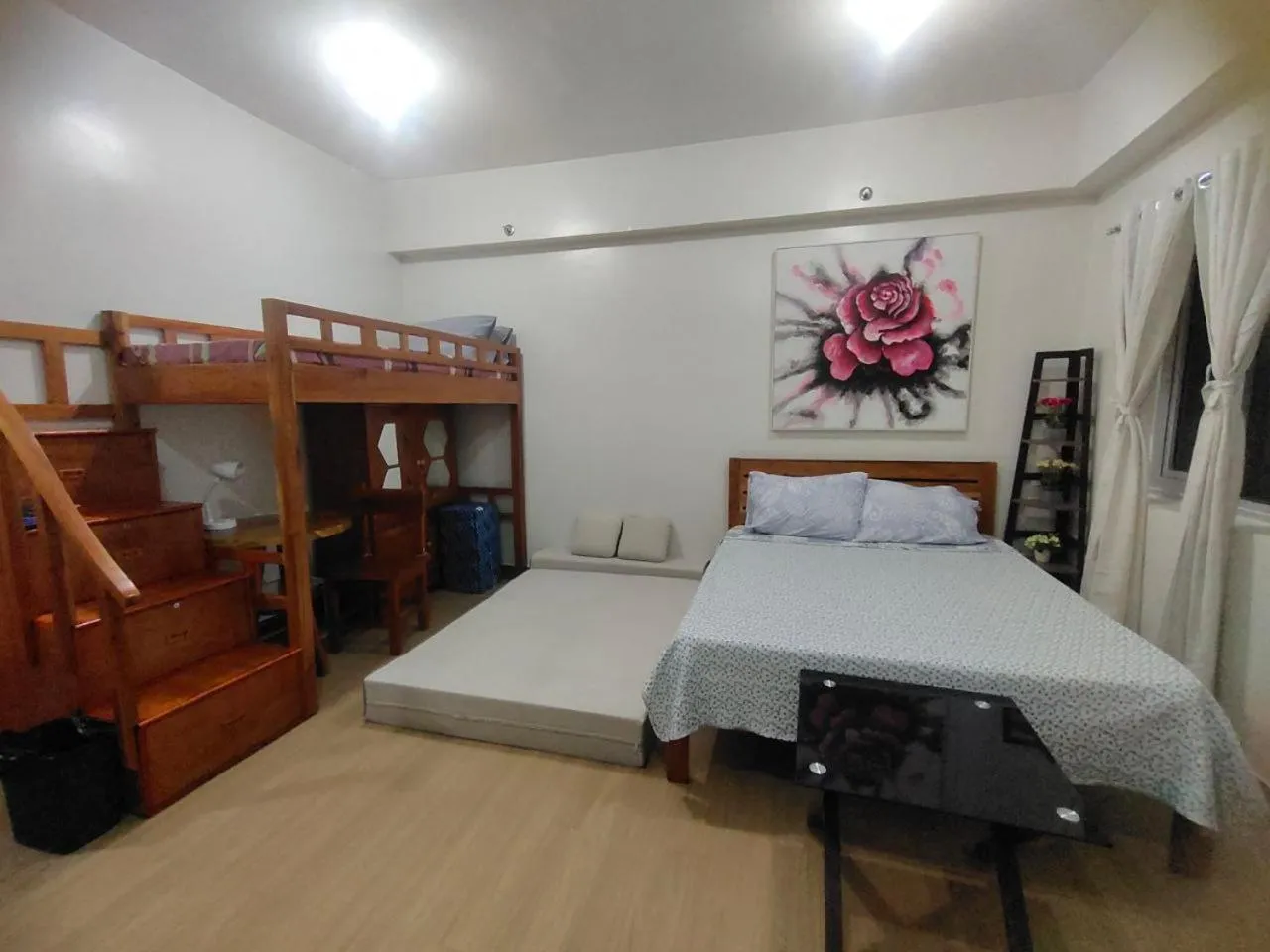 Bed in Happy Stays B - End Unit Greenery View at SMDC Hope Residences