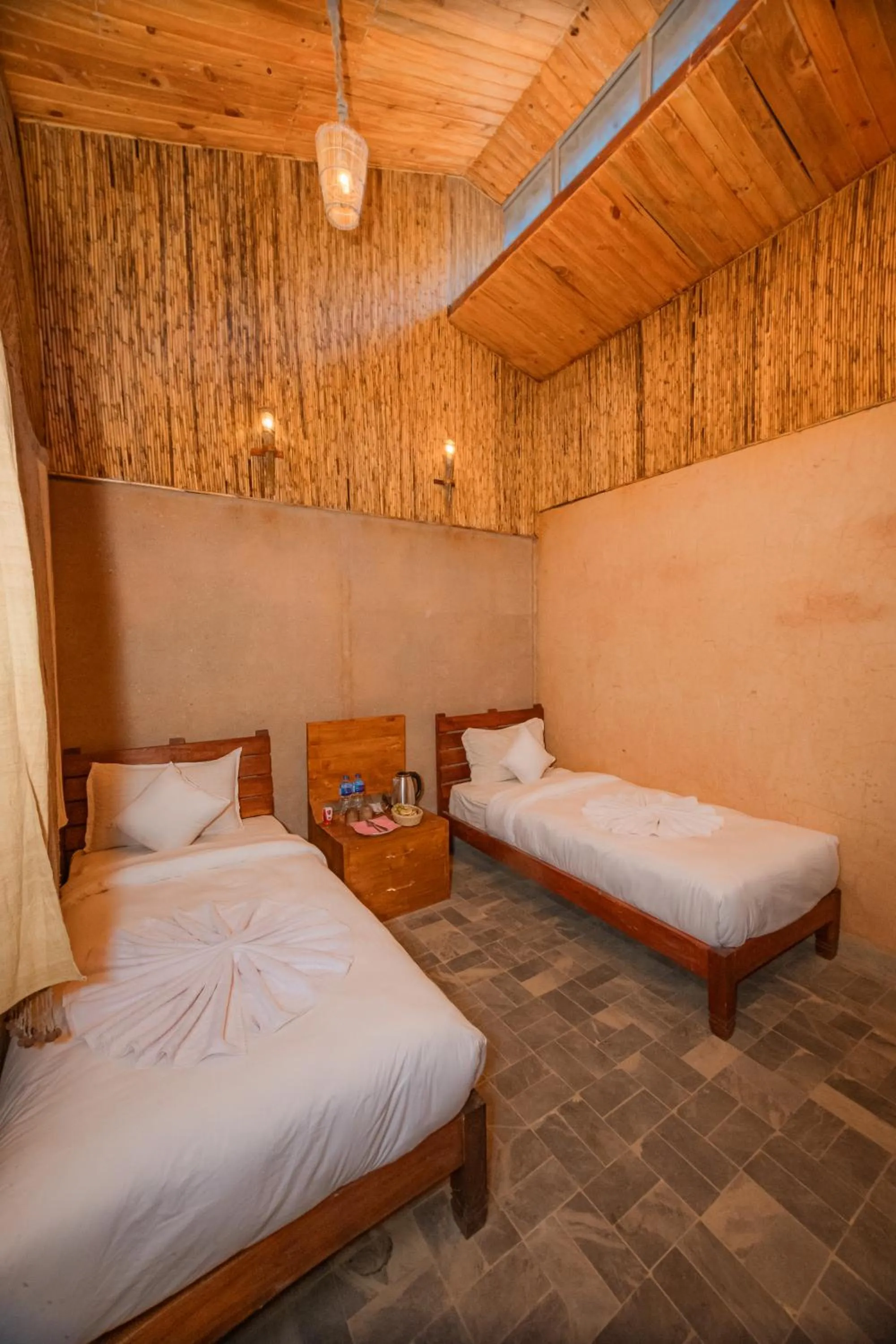 Bed in Bagaicha Adventure Resort