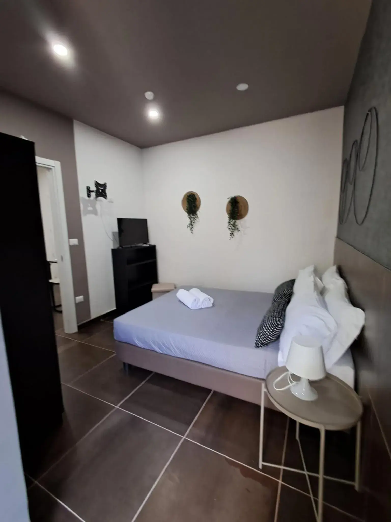 Bed in Hotel apartments Crisvan Bed in Hotel apartments Crisvan