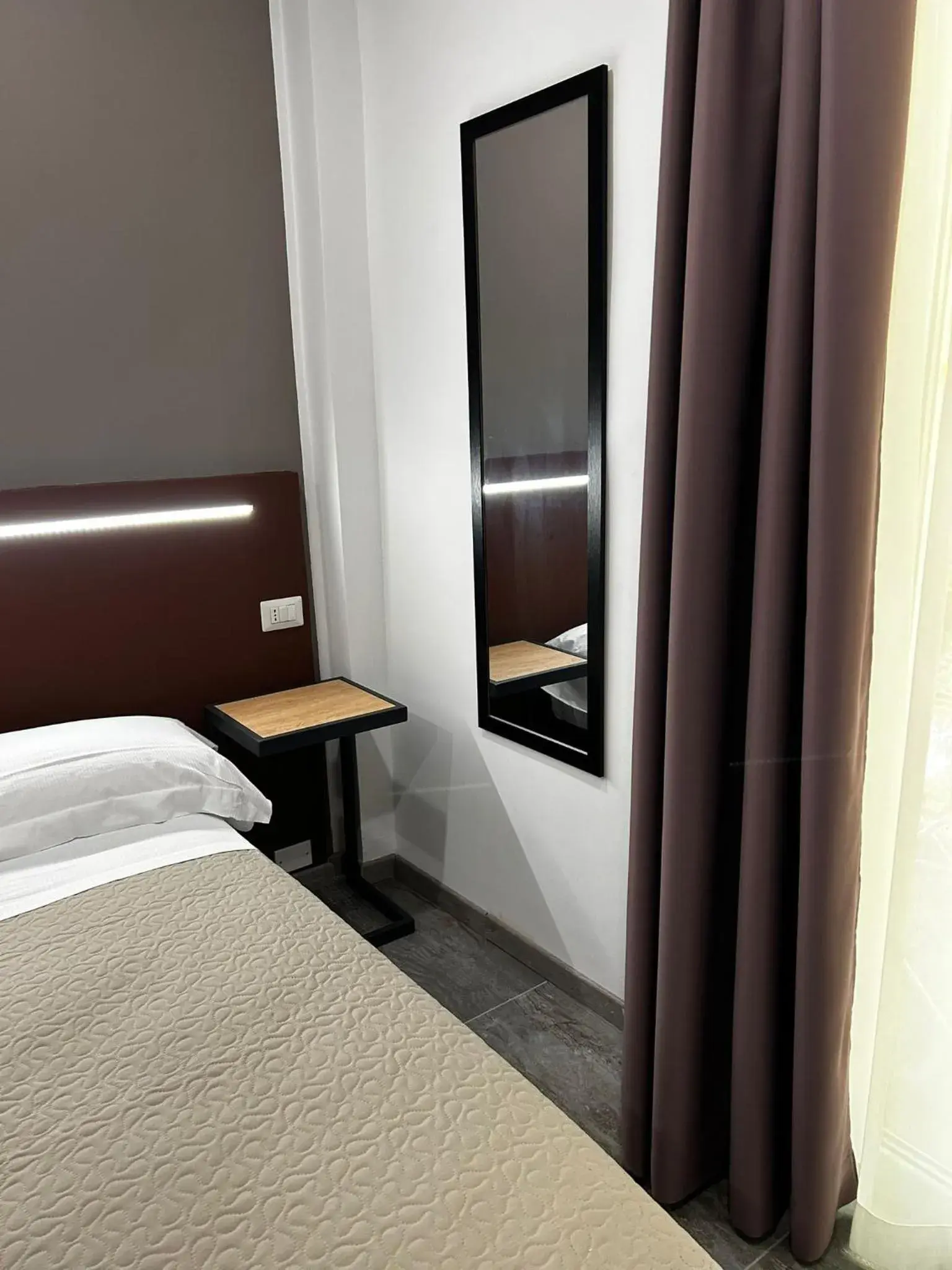 Bed in Hotel apartments Crisvan Bed in Hotel apartments Crisvan