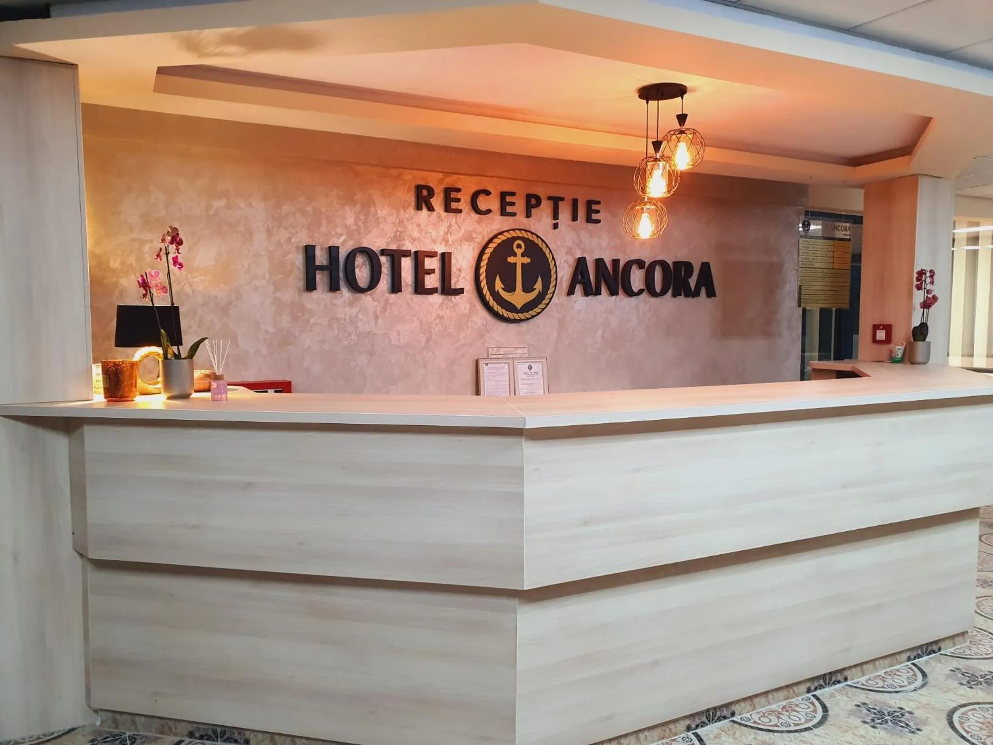 Property logo or sign in Hotel Ancora
