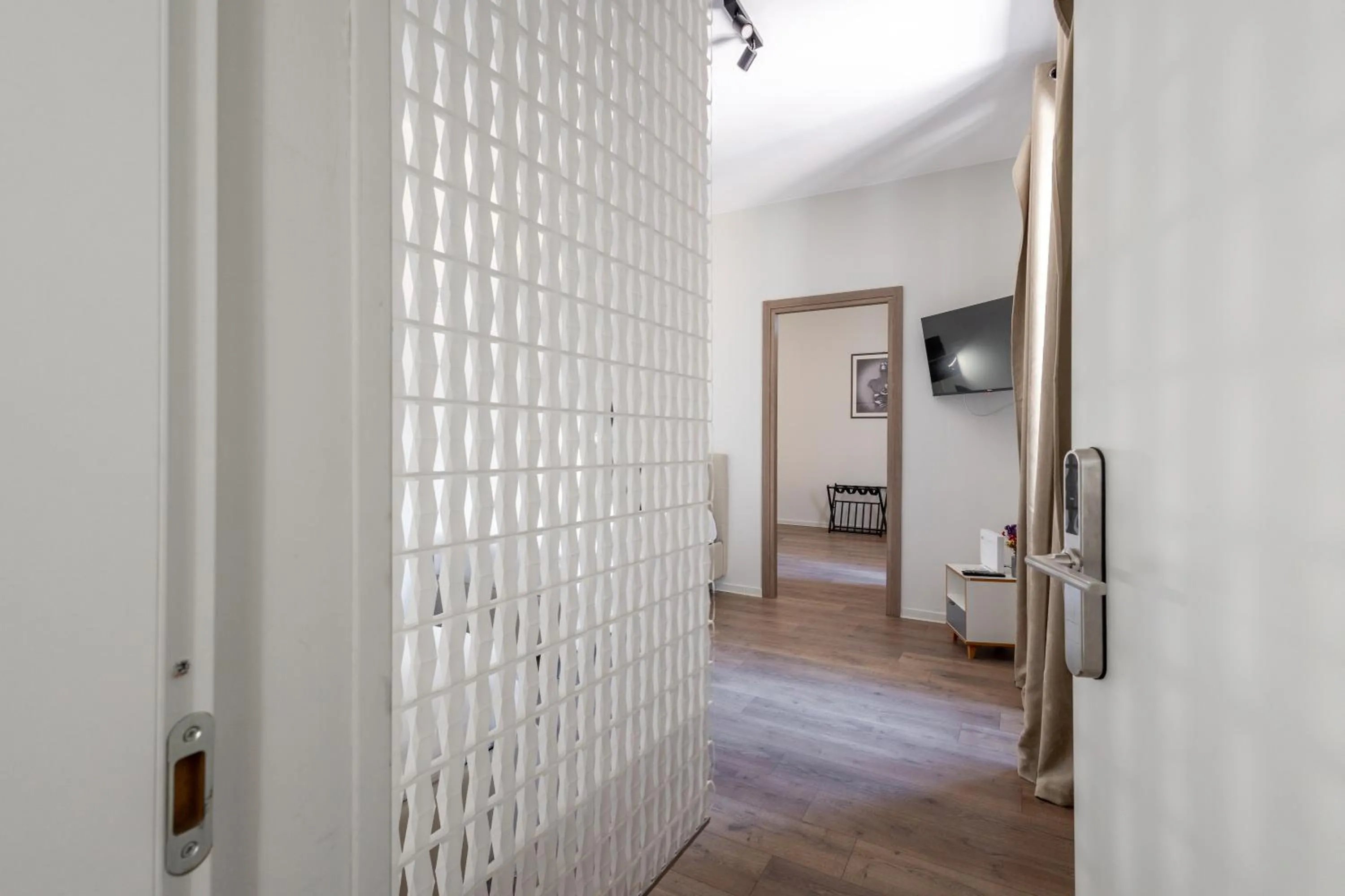 Photo of the whole room in SOHO Piaggiarelle by Dasso - Guest House