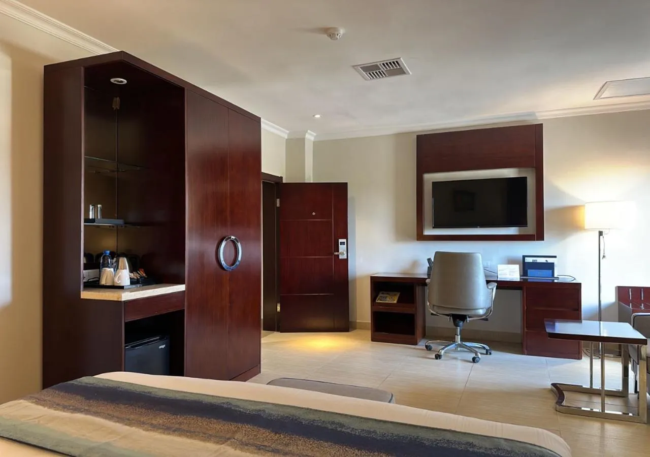 TV and multimedia, Bed in Grand Palace Hotel Lusaka