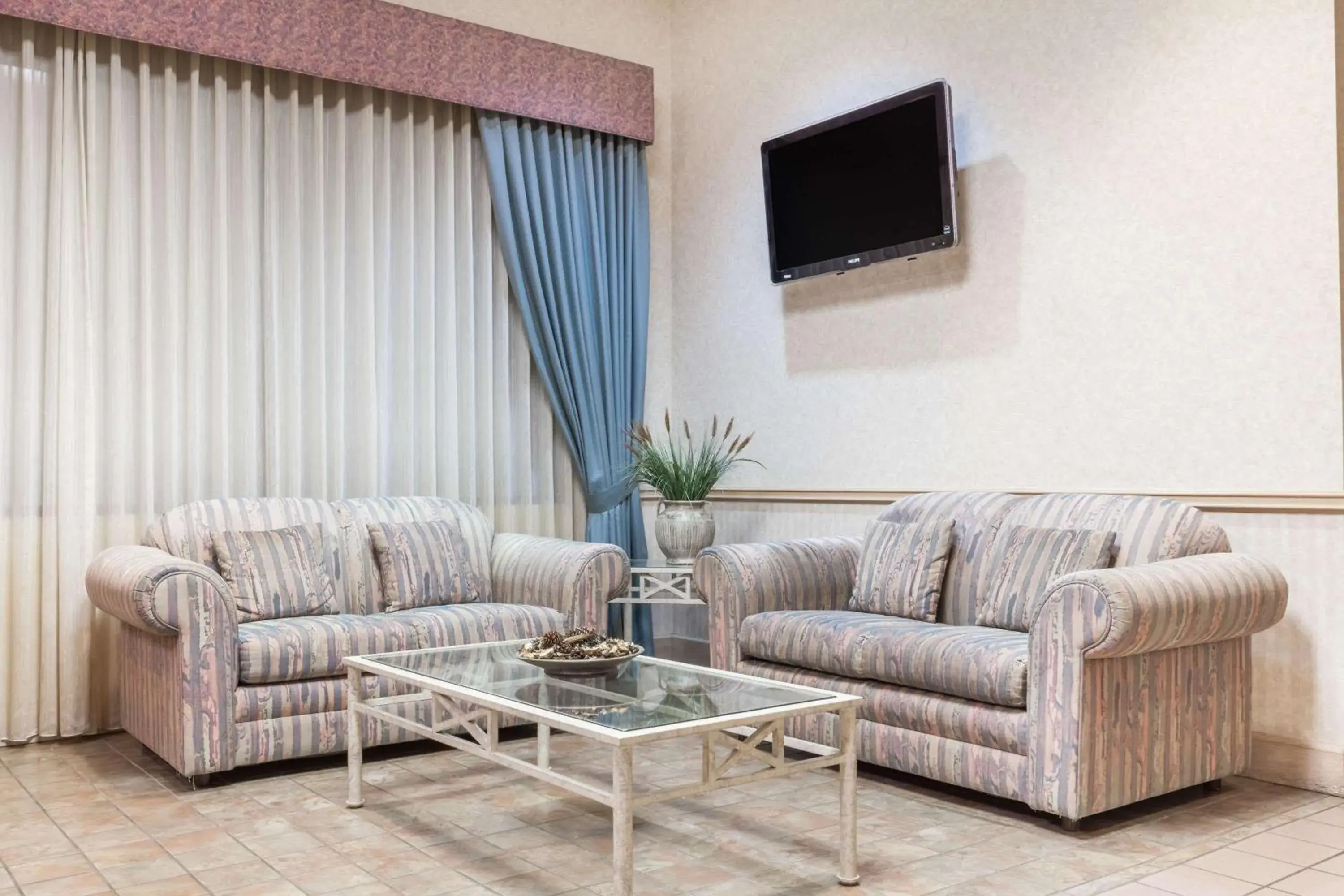 Lobby or reception in Super 8 by Wyndham Jasper TX Lobby or reception in Super 8 by Wyndham Jasper TX