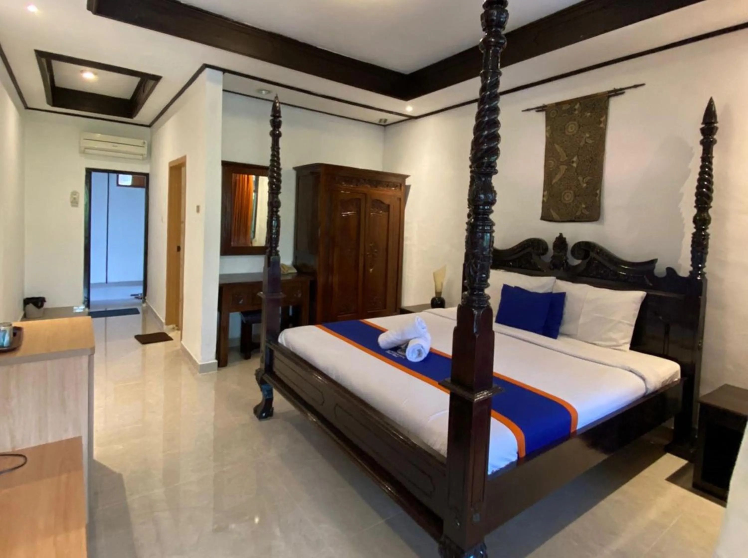 Bed in New Adirama Beach Hotel