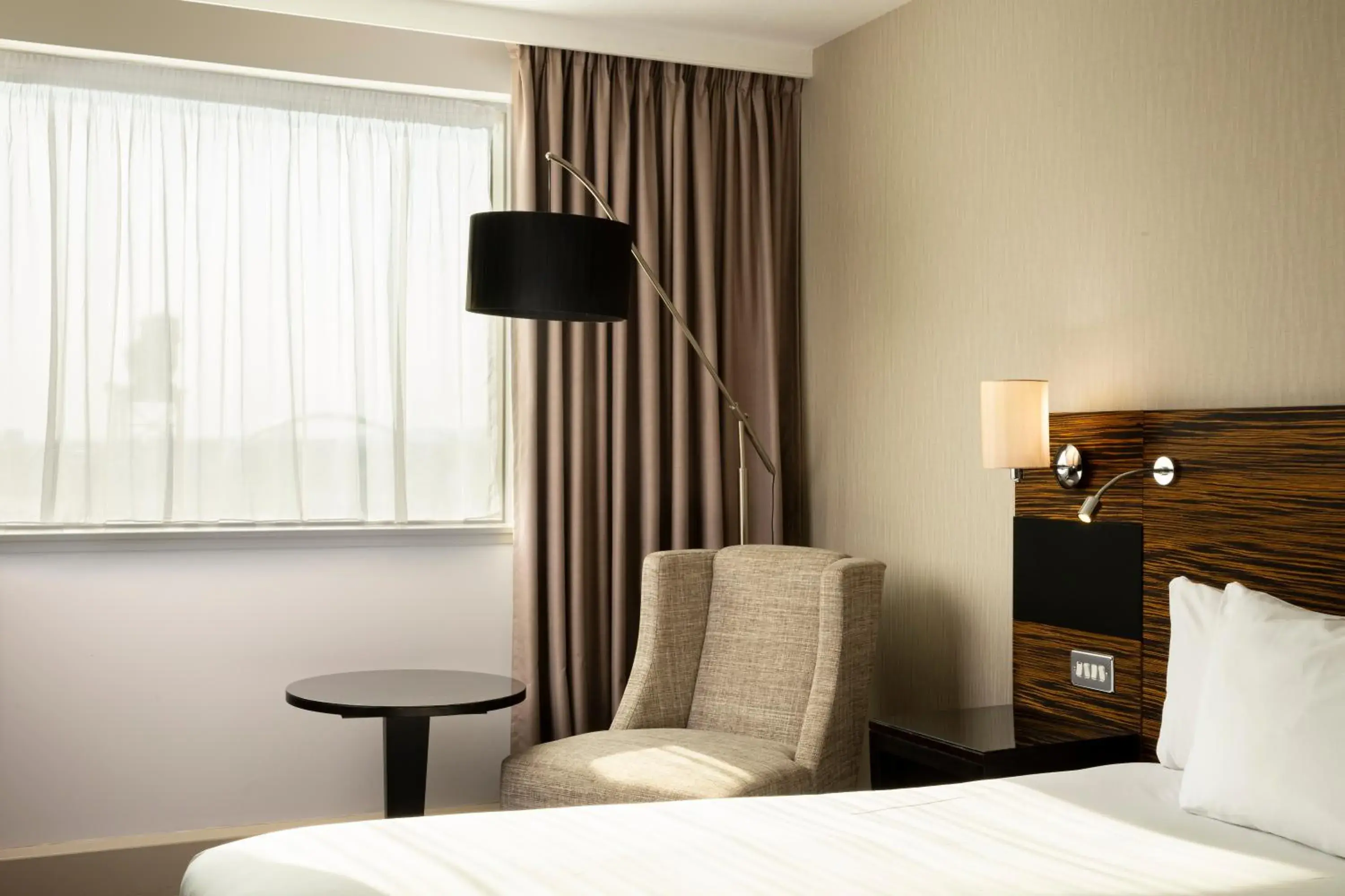 Seating area, Bed in Crowne Plaza Glasgow by IHG Seating area, Bed in Crowne Plaza Glasgow by IHG
