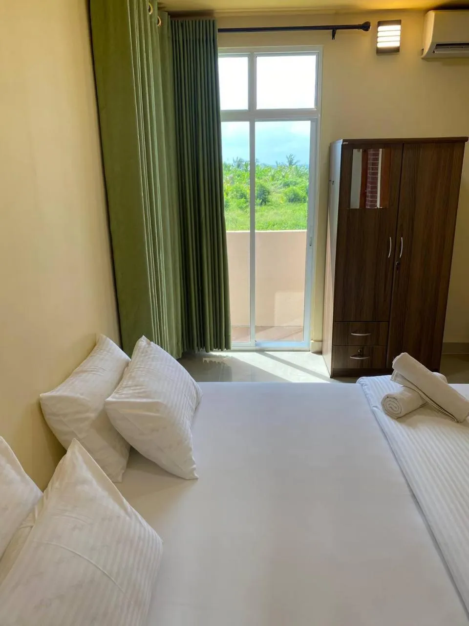 Bed in White Sand Inn