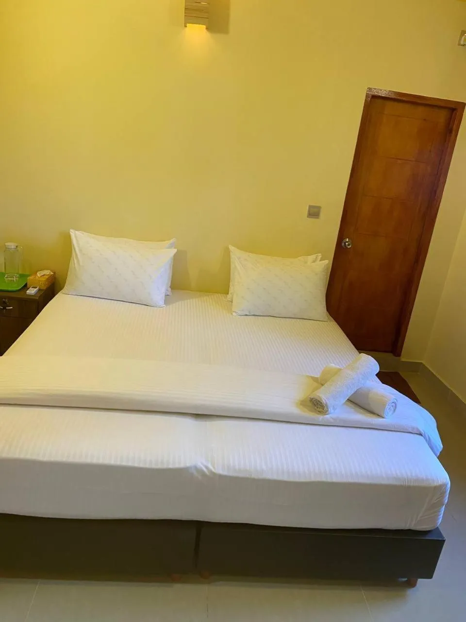 Bed in White Sand Inn