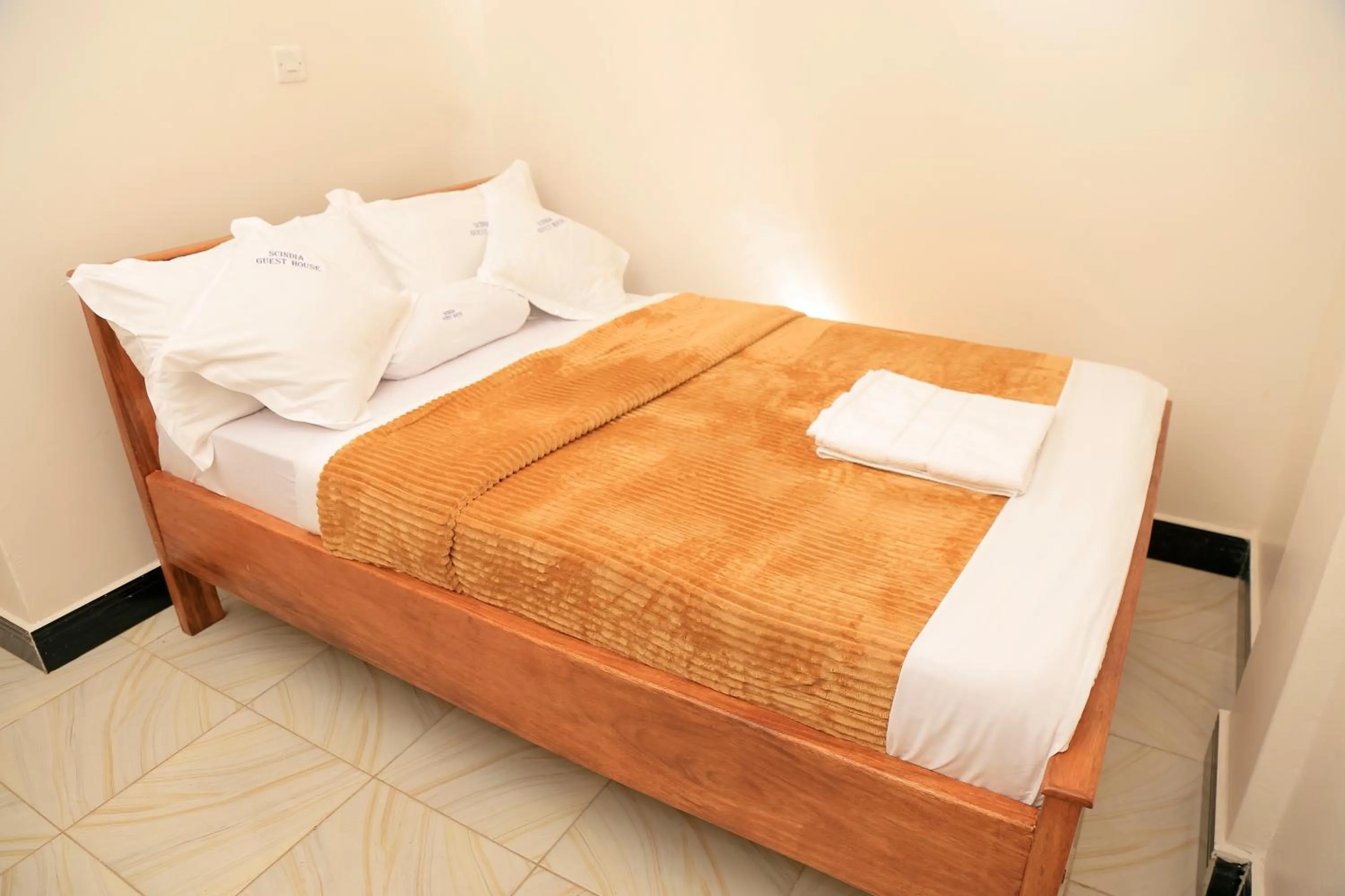 Bed in Scindia Suites hotel