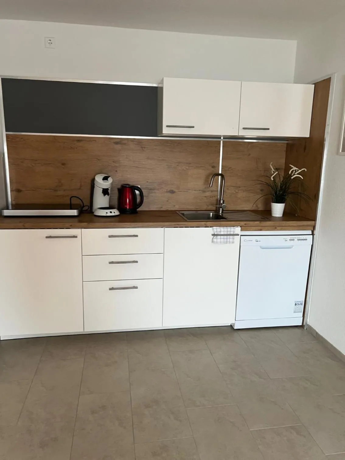 Kitchen or kitchenette in New Age Boardinghaus Bad Wimpfen