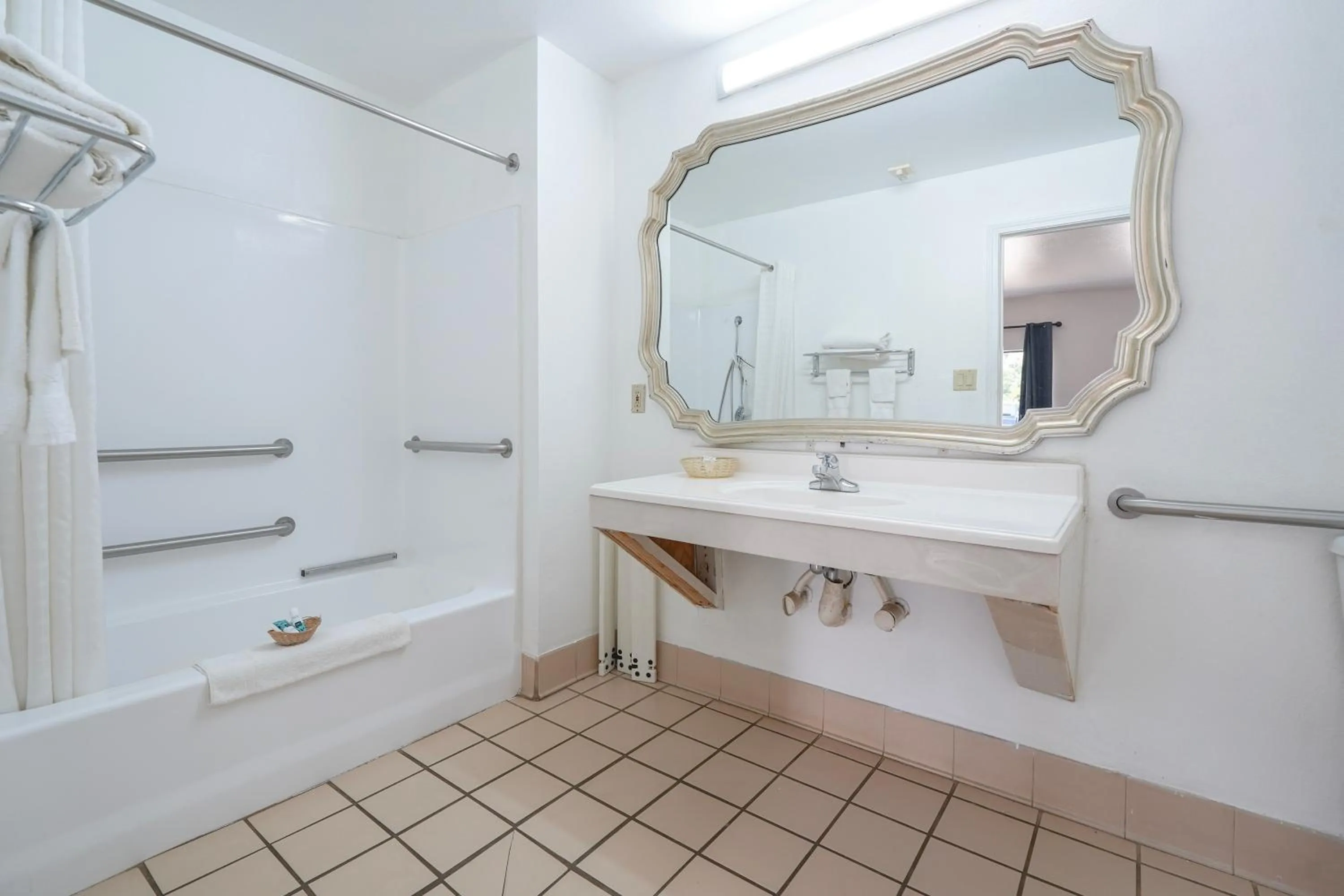 Bathroom in Budget inn by Oyo San Augustine