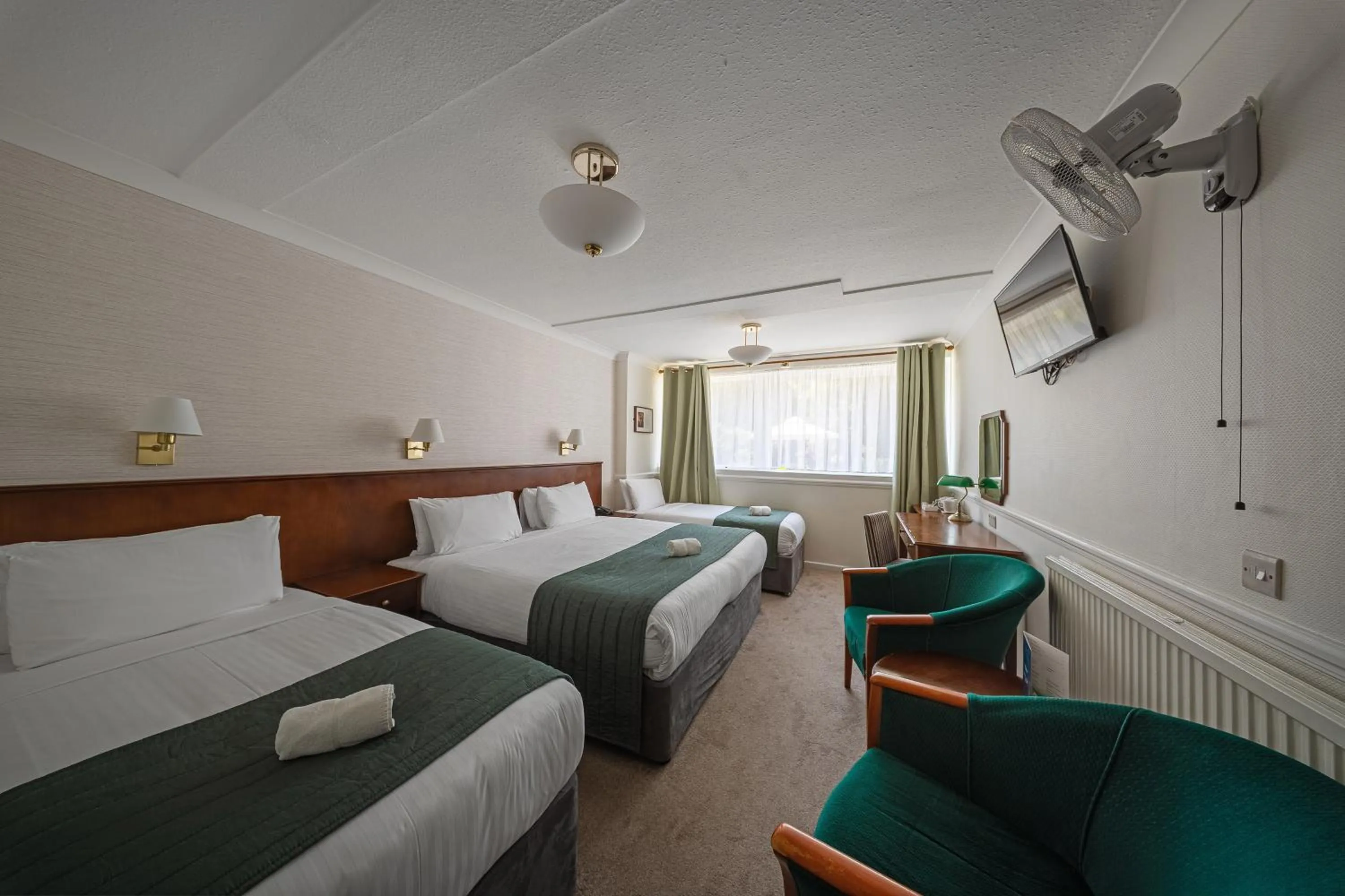 Bed in The Clarendon Hotel