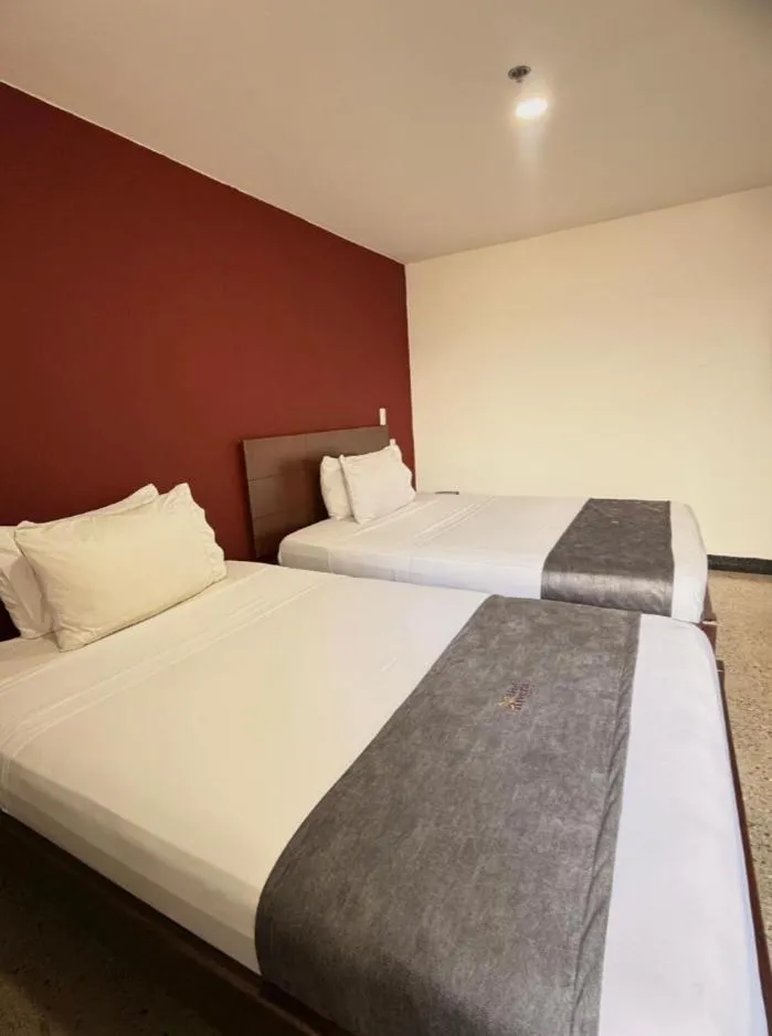 Bed in HOTEL RIVERA CENTRAL