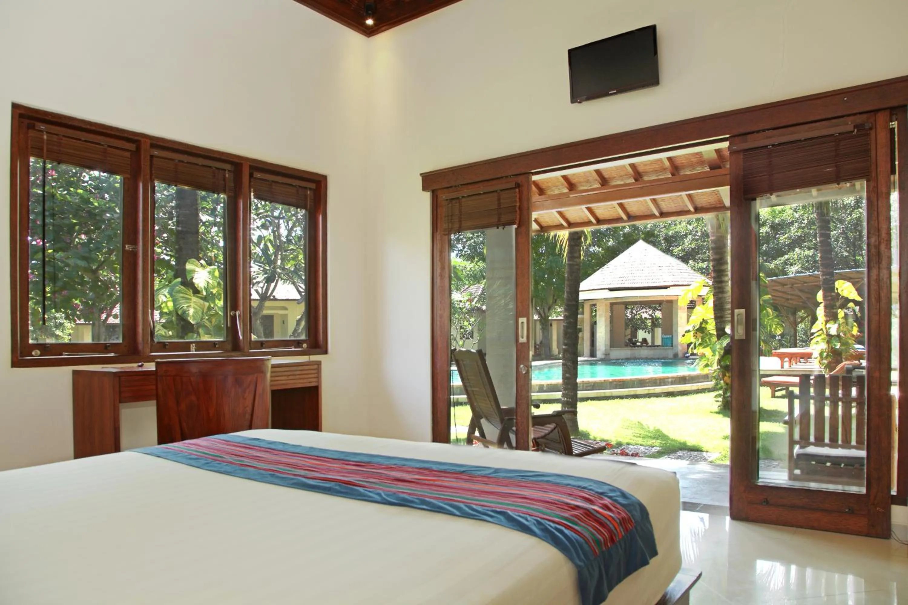 Photo of the whole room, Bed in Puri Rinjani Bungalows & Hostel