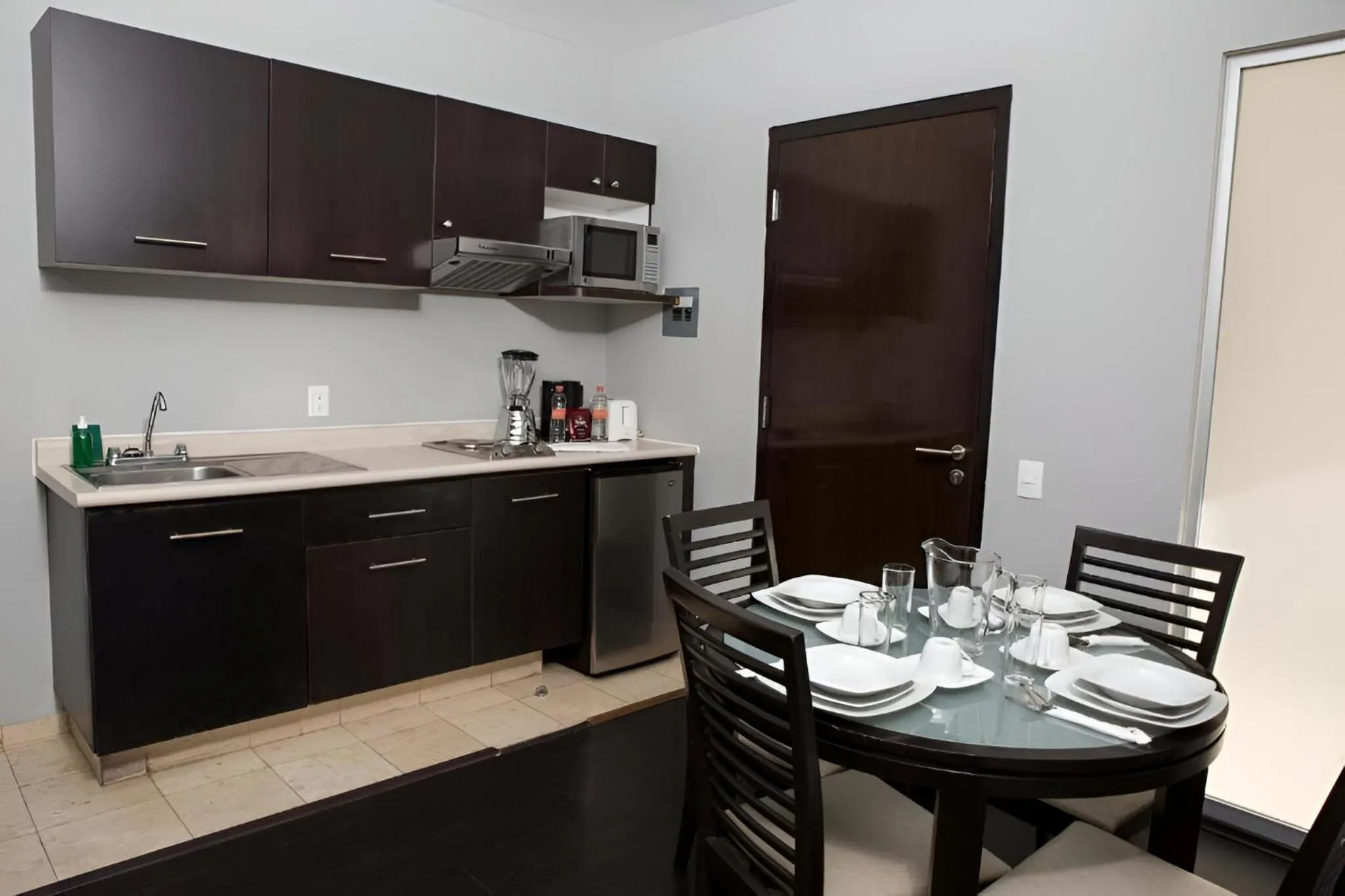 Kitchen or kitchenette in Suites Giorgio