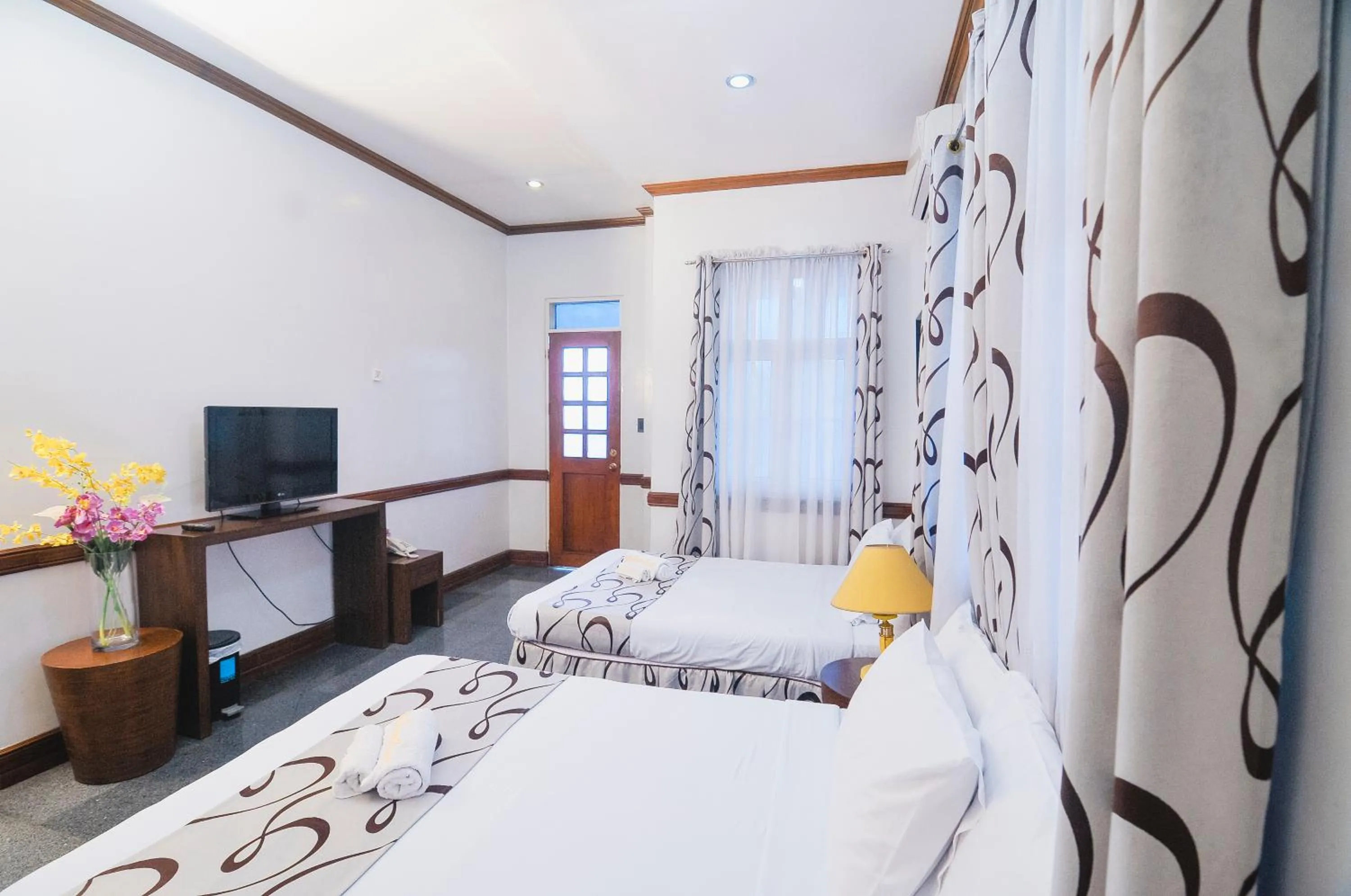 Photo of the whole room, Bed in Villa Jhoana Resort