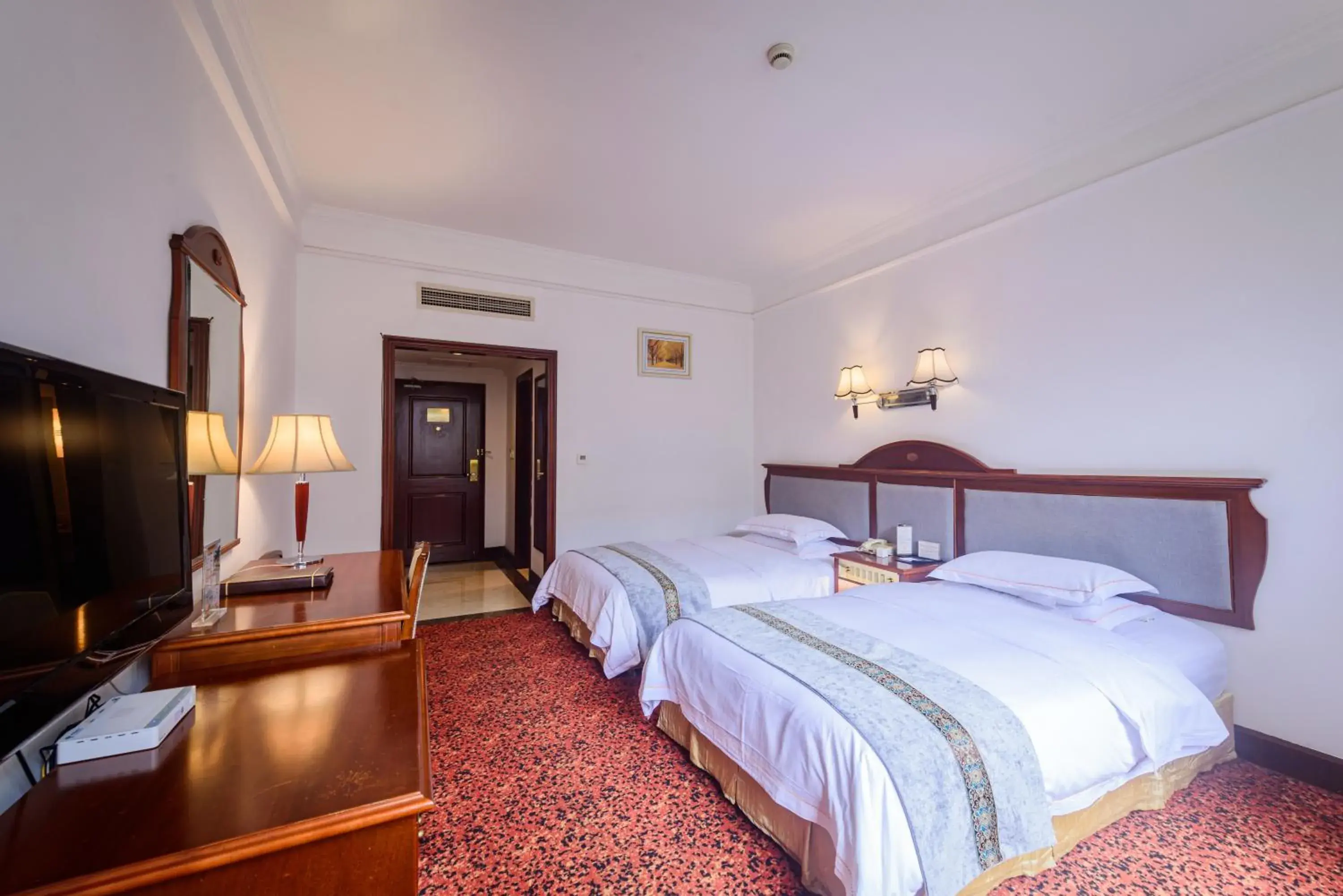 Photo of the whole room, Bed in E-mei Mountain Hotel Photo of the whole room, Bed in E-mei Mountain Hotel