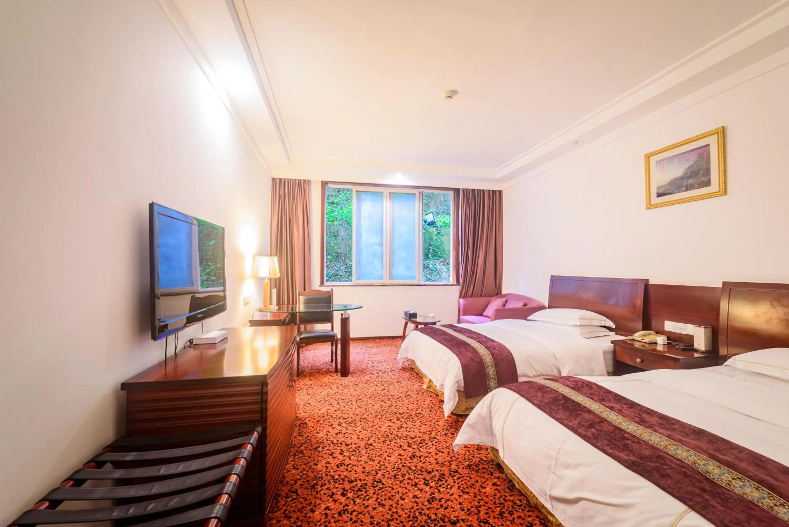 Photo of the whole room, Bed in E-mei Mountain Hotel