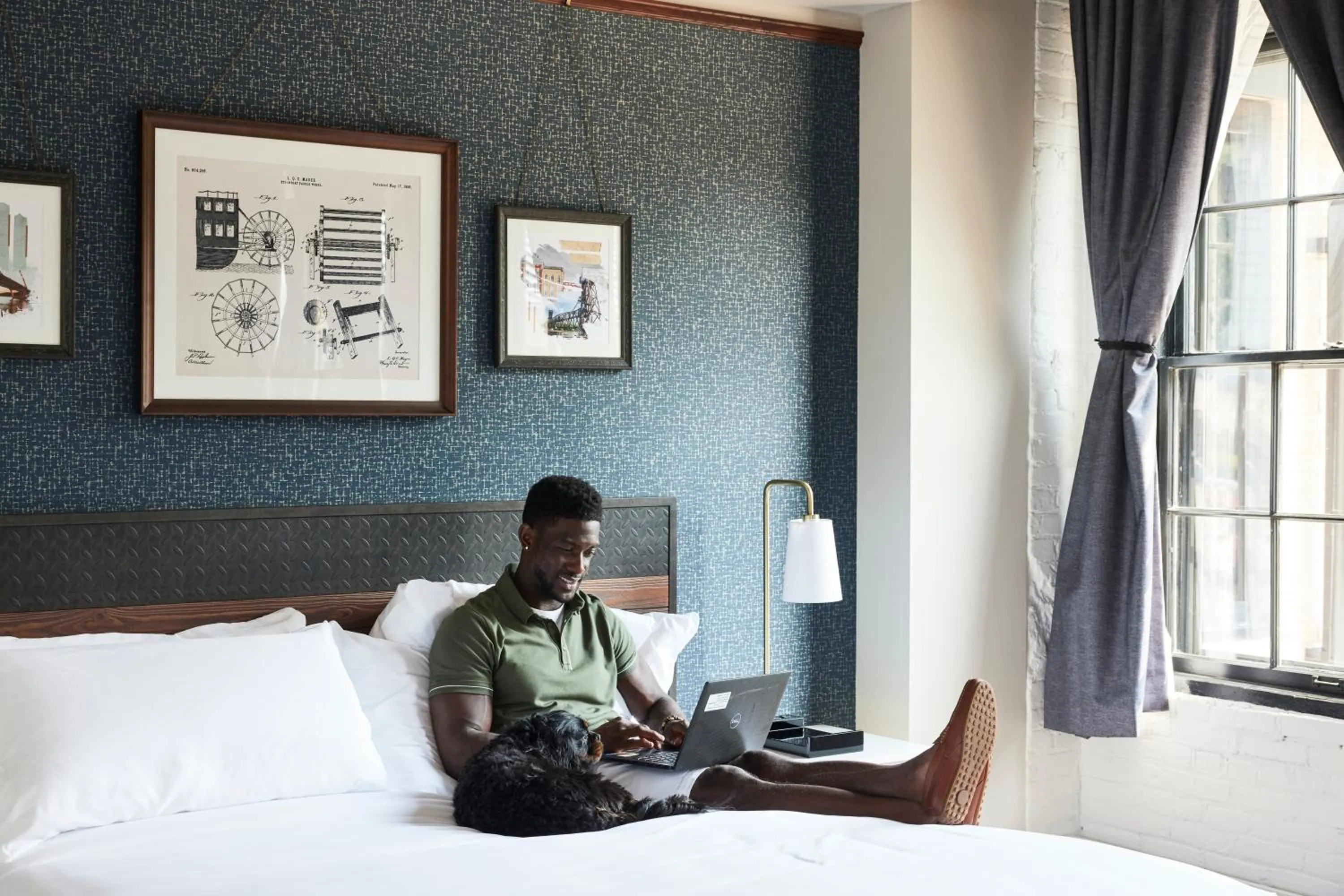 Bed in The Confluence Hotel