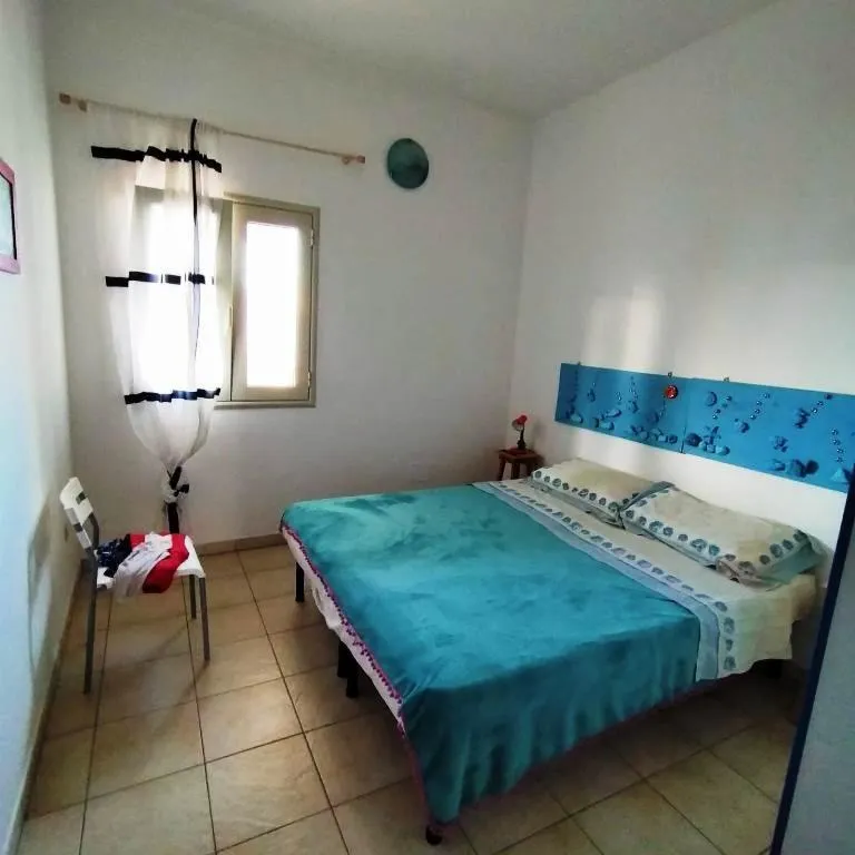 Photo of the whole room, Bed in Residence Giglio