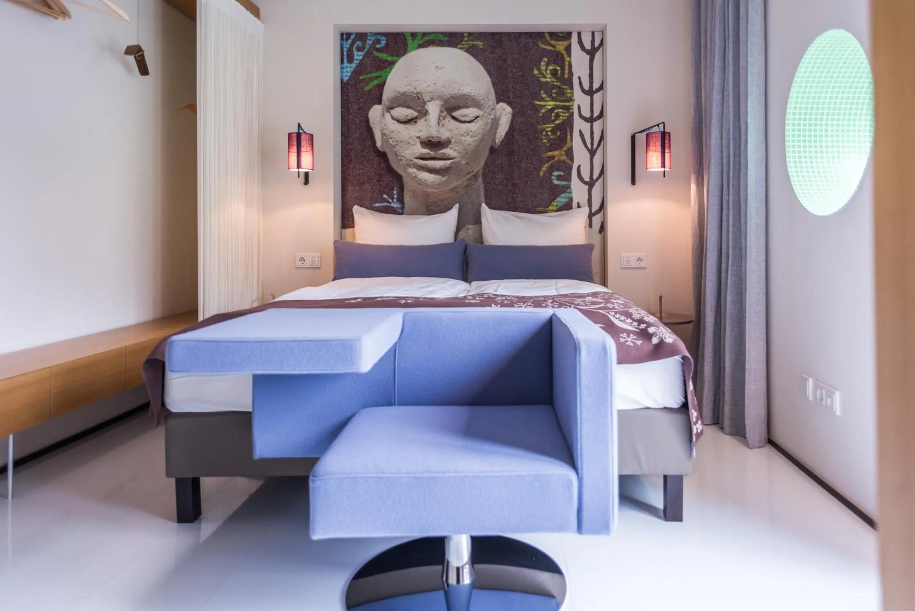 Seating area, Bed in Nala Individuellhotel