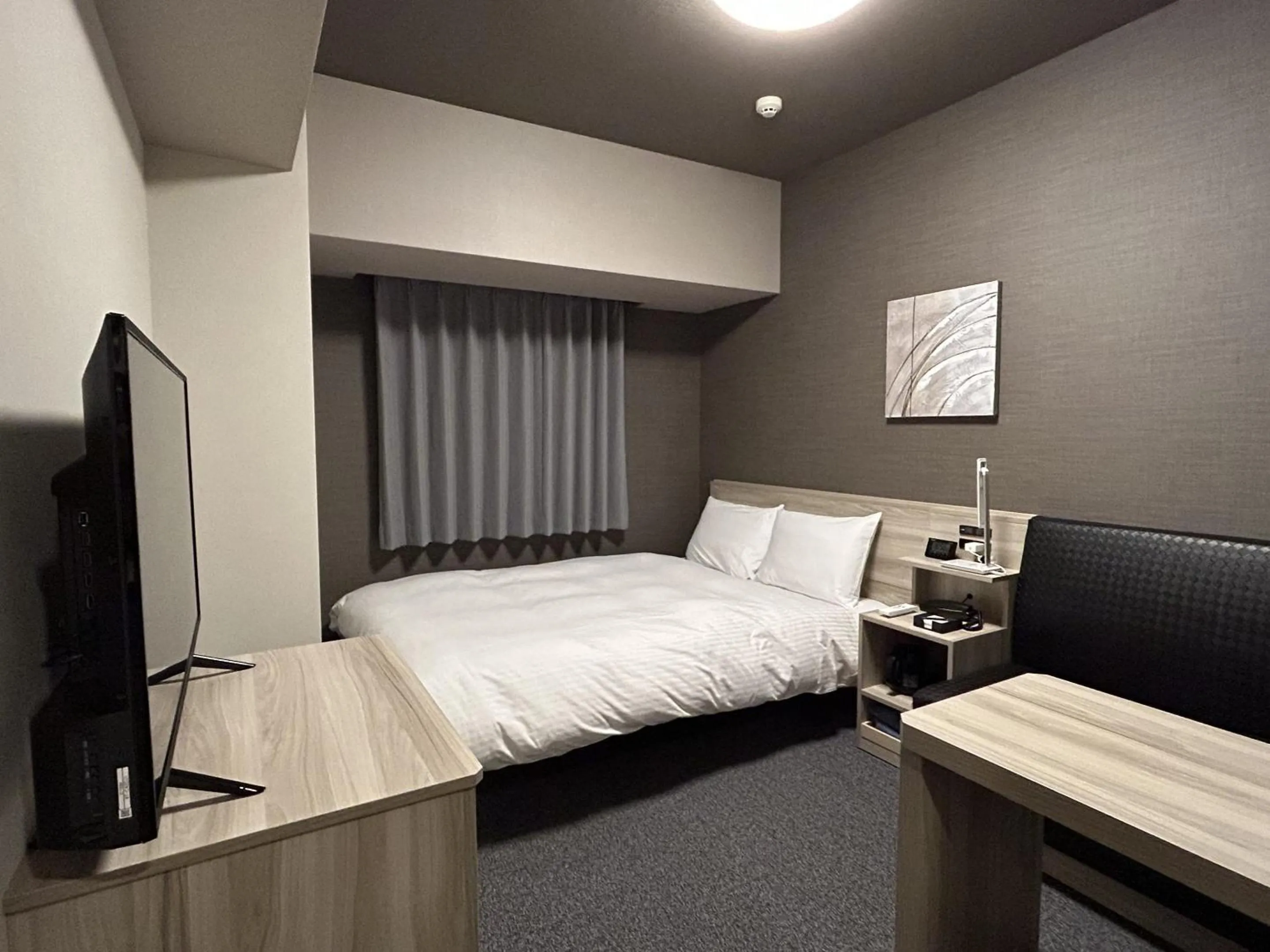 Photo of the whole room, Bed in Hotel Route Inn Owariseto Ekimae