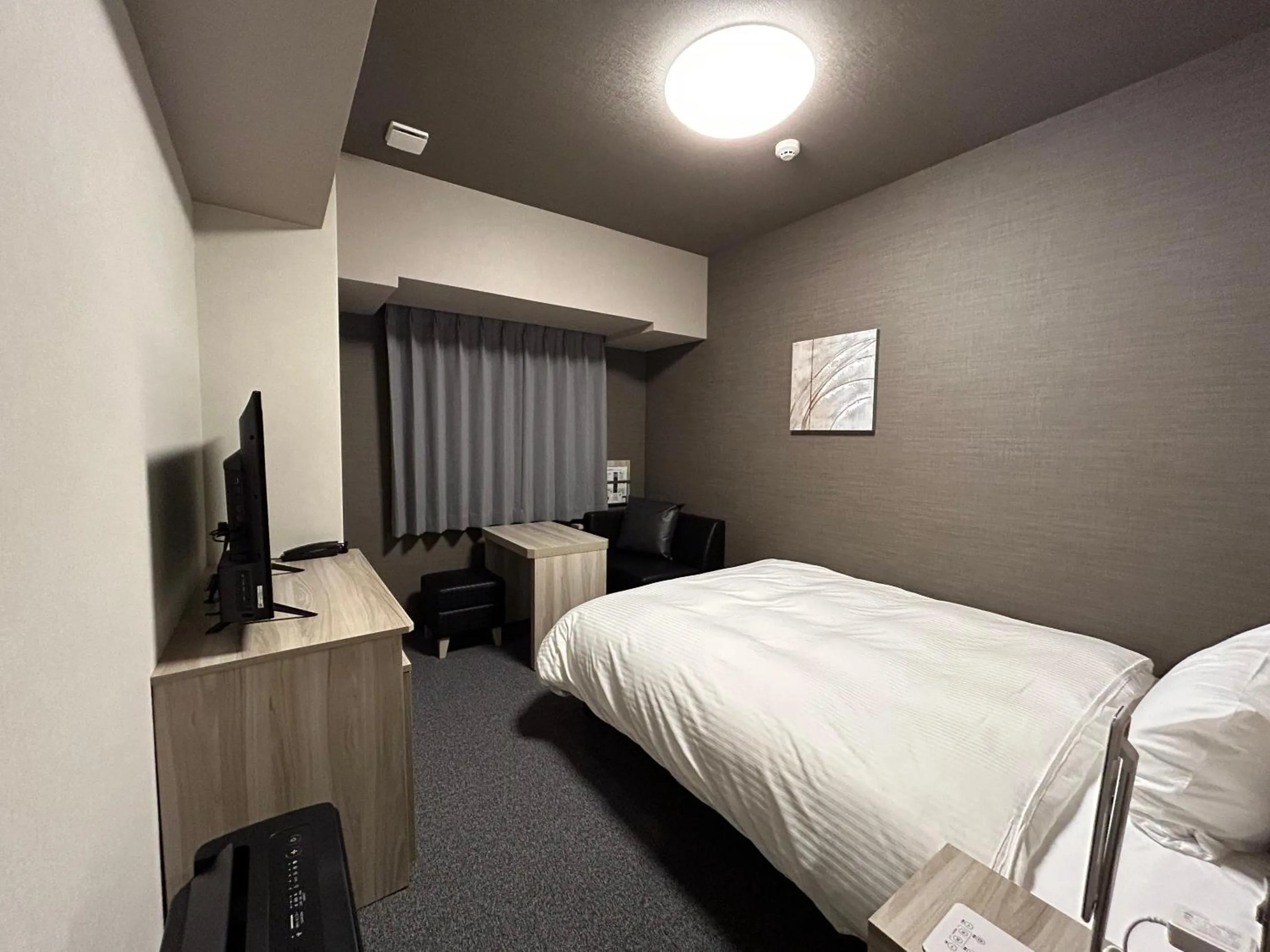 Photo of the whole room, Bed in Hotel Route Inn Owariseto Ekimae