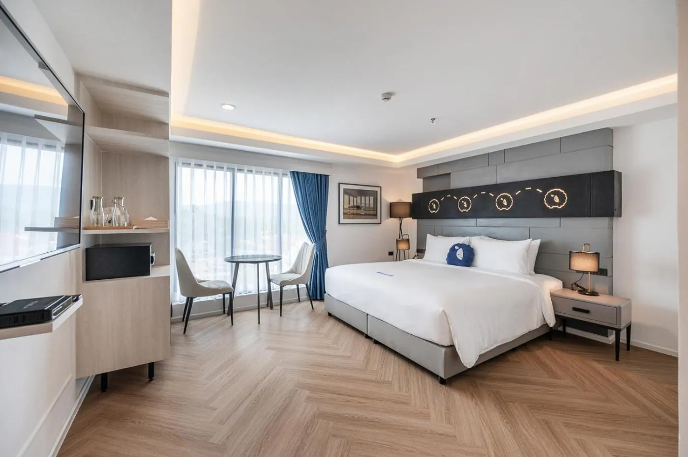 Bed in Kokotel Chiang Rai Airport Suites