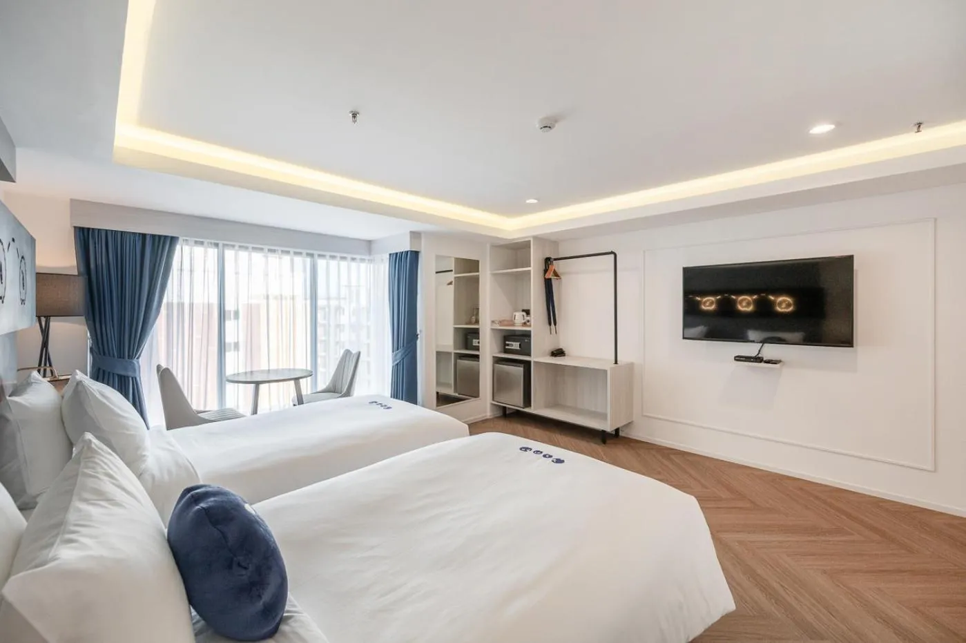 Bed in Kokotel Chiang Rai Airport Suites