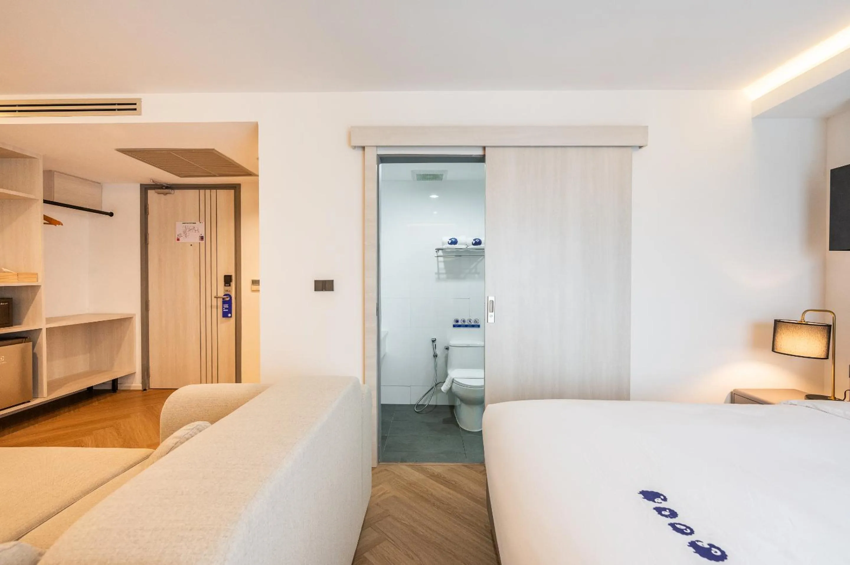 Photo of the whole room, Bed in Kokotel Chiang Rai Airport Suites