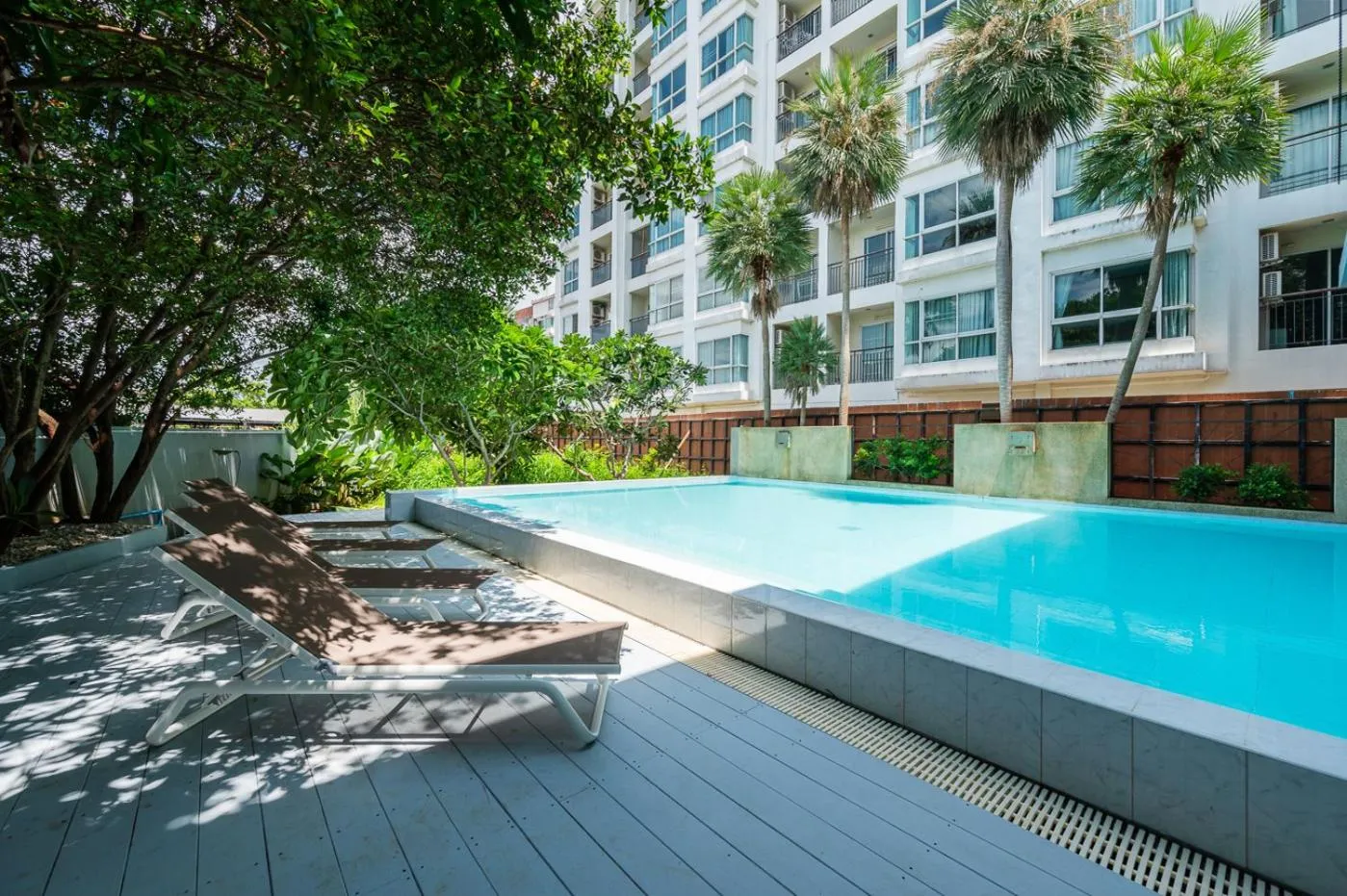 Swimming pool in Kokotel Chiang Rai Airport Suites