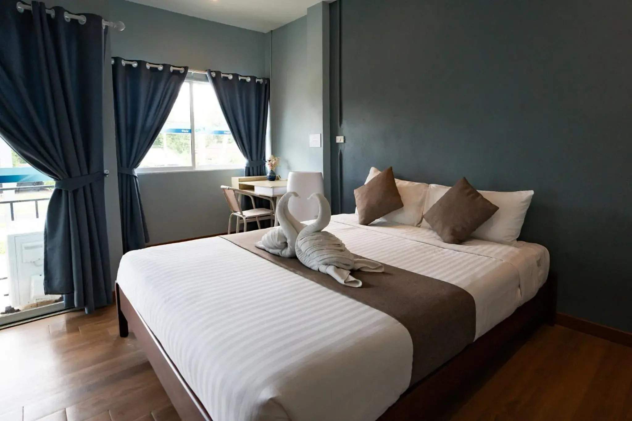 Photo of the whole room, Bed in A Hotel Cozy Photo of the whole room, Bed in A Hotel Cozy