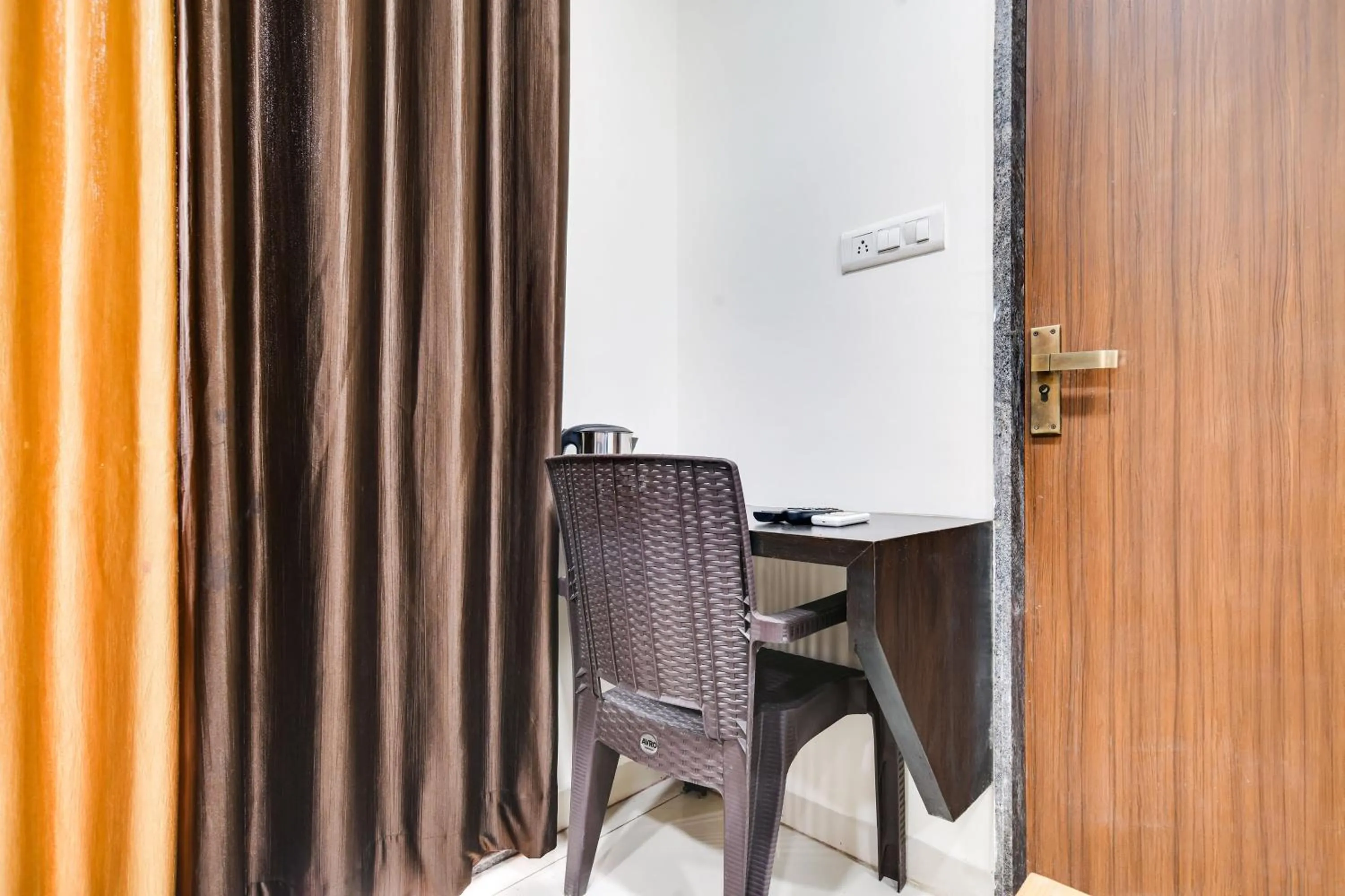 Bedroom in Collection O Indore Near Omax City 1