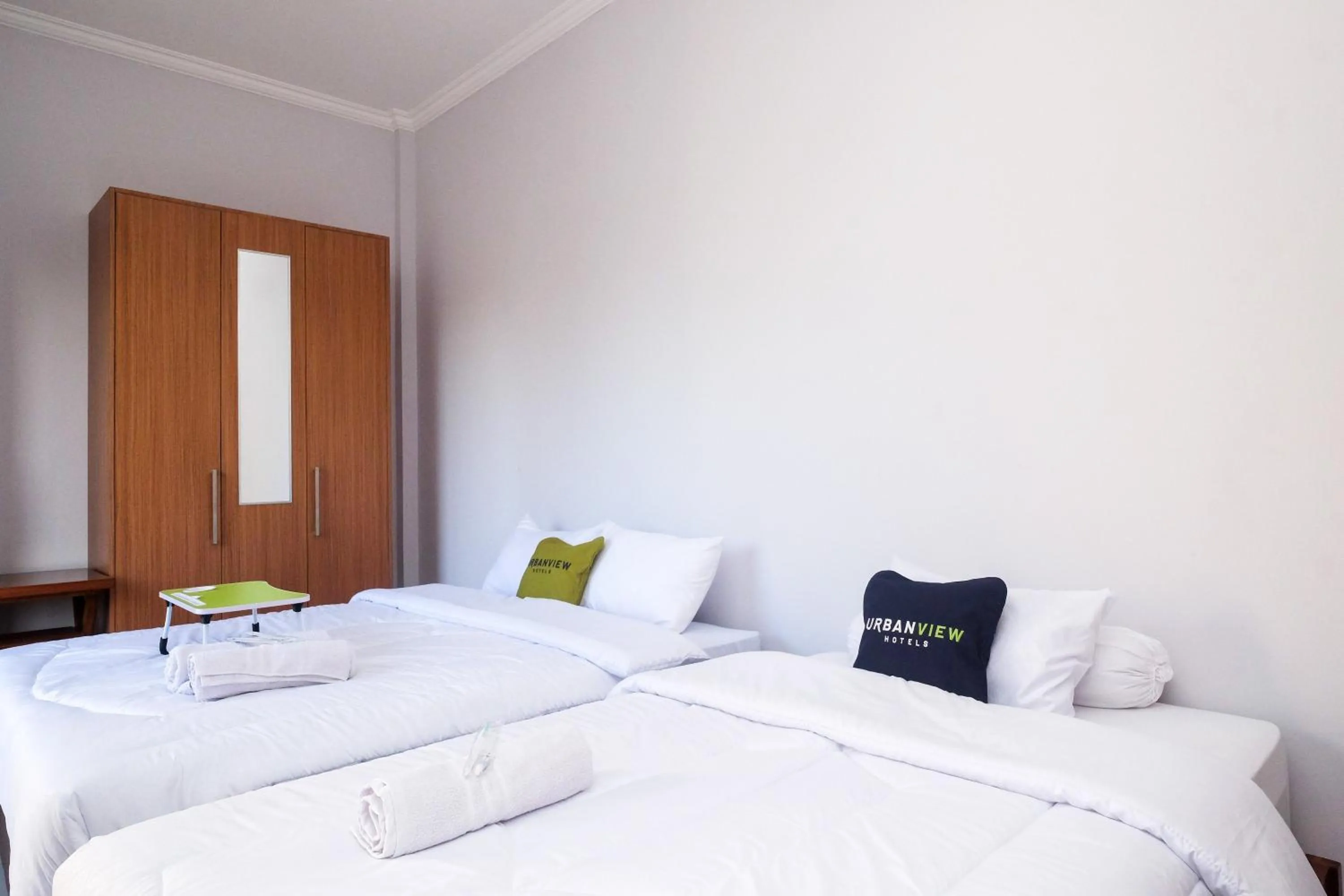 Bed in Urbanview Syariah Loji Arum Stasiun Klaten by RedDoorz