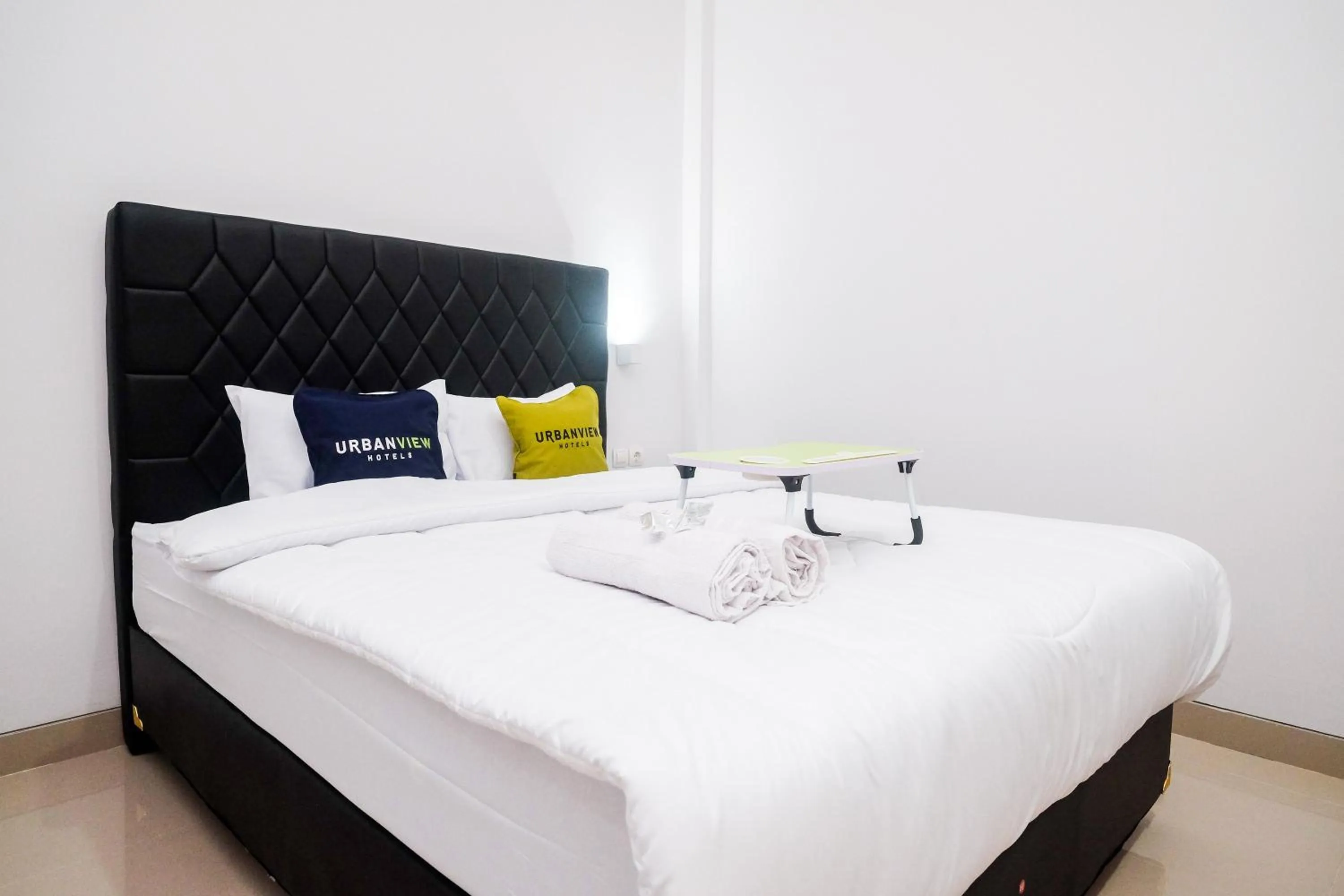 Bed in Urbanview Syariah Loji Arum Stasiun Klaten by RedDoorz