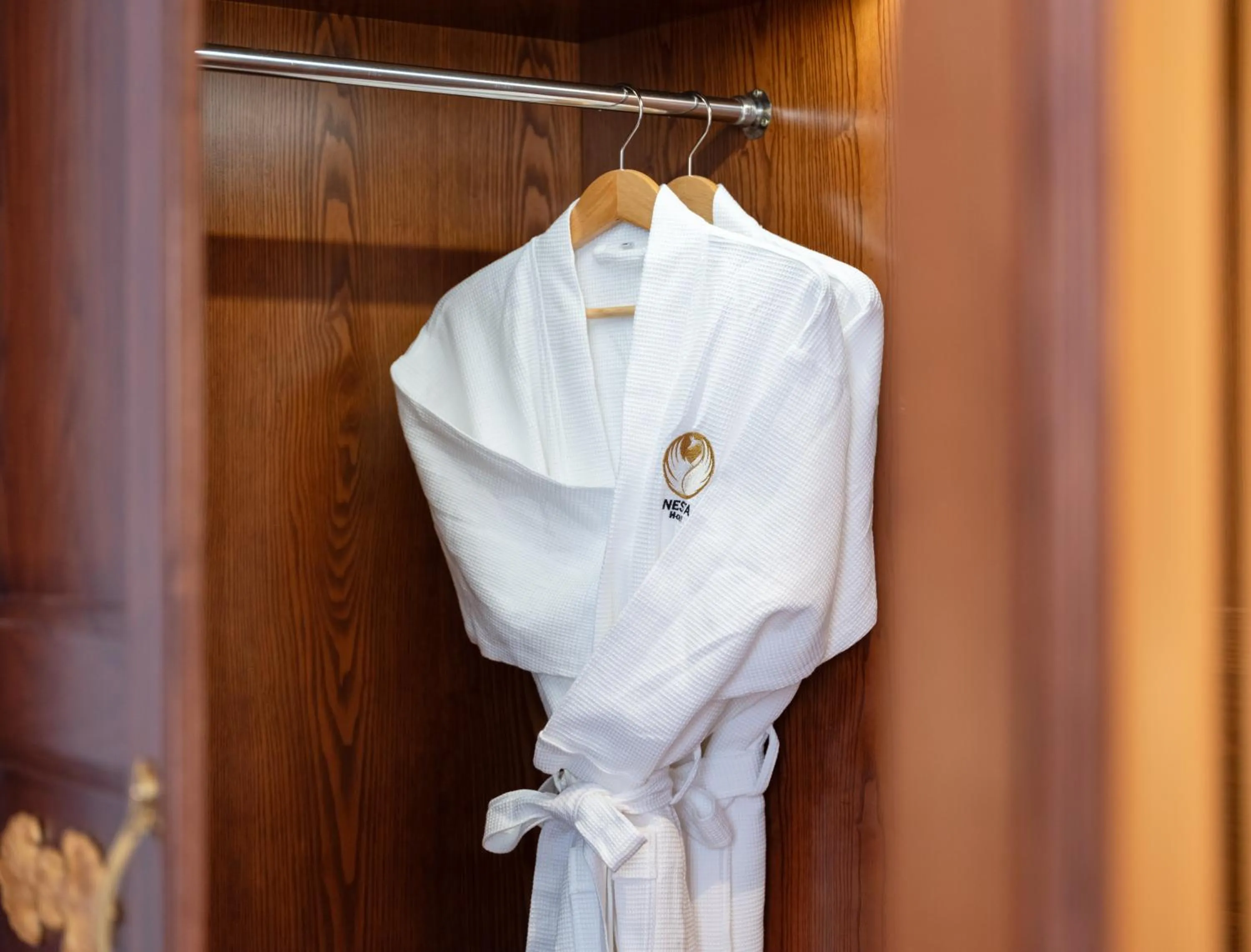 wardrobe in Nesta Hotel & Spa