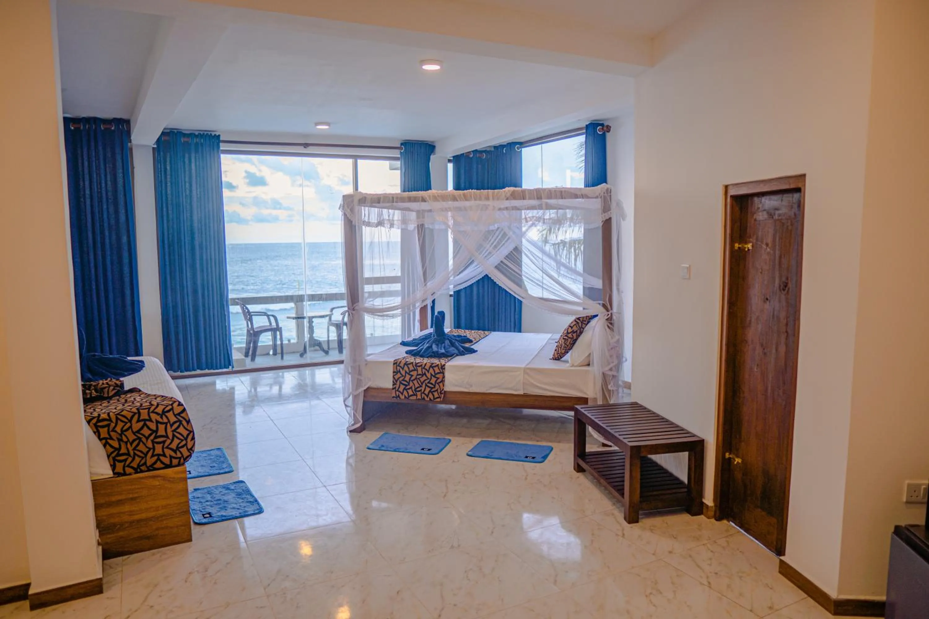 Bed in Cool Beach Hotel