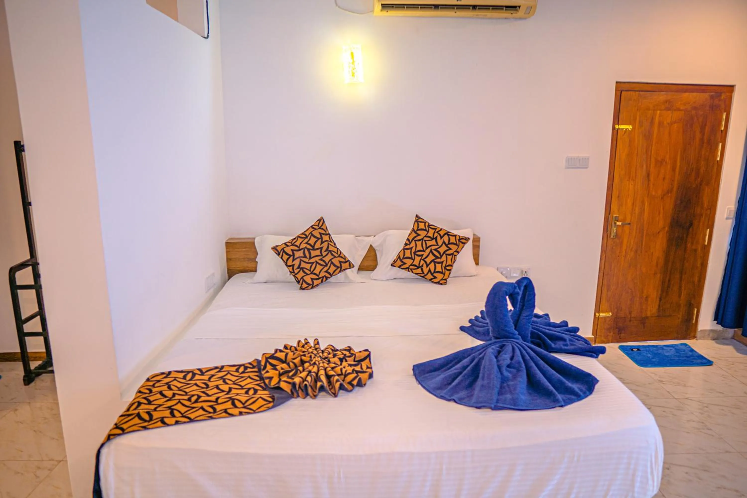 Bed in Cool Beach Hotel