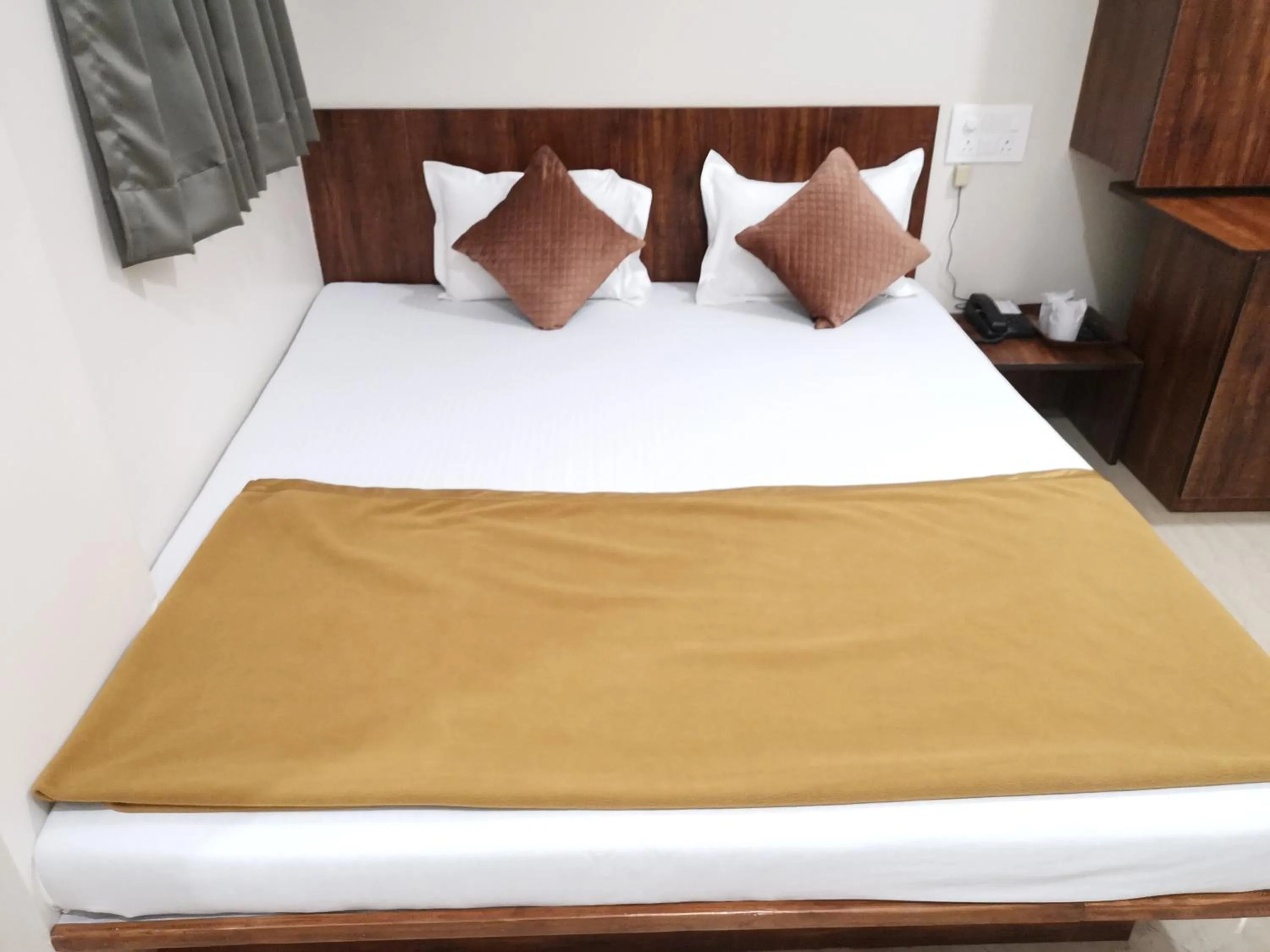 Bed in Hotel Darshan Grand