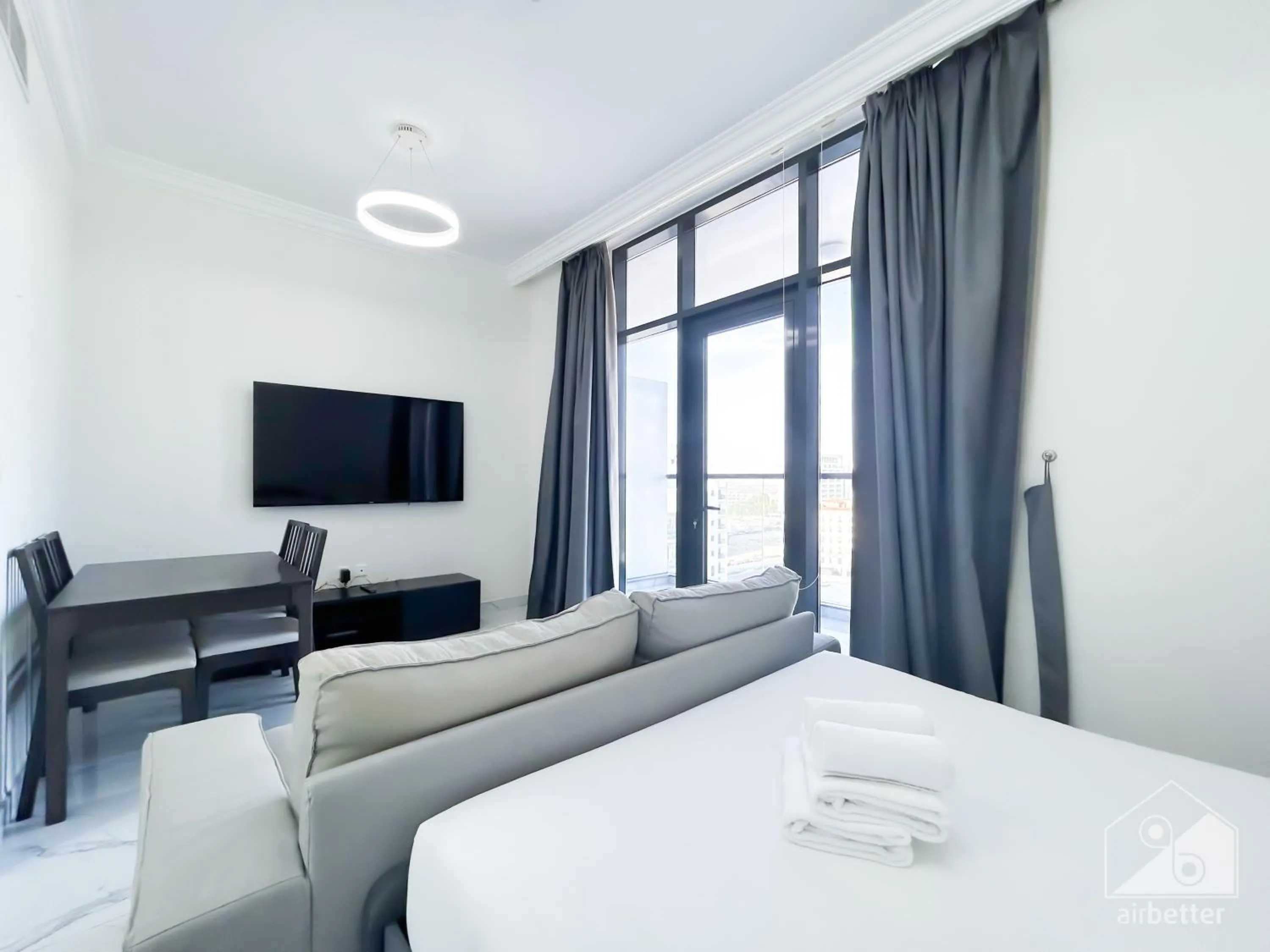 Living room, Bed in Spacious Studio with balcony in AL Majan