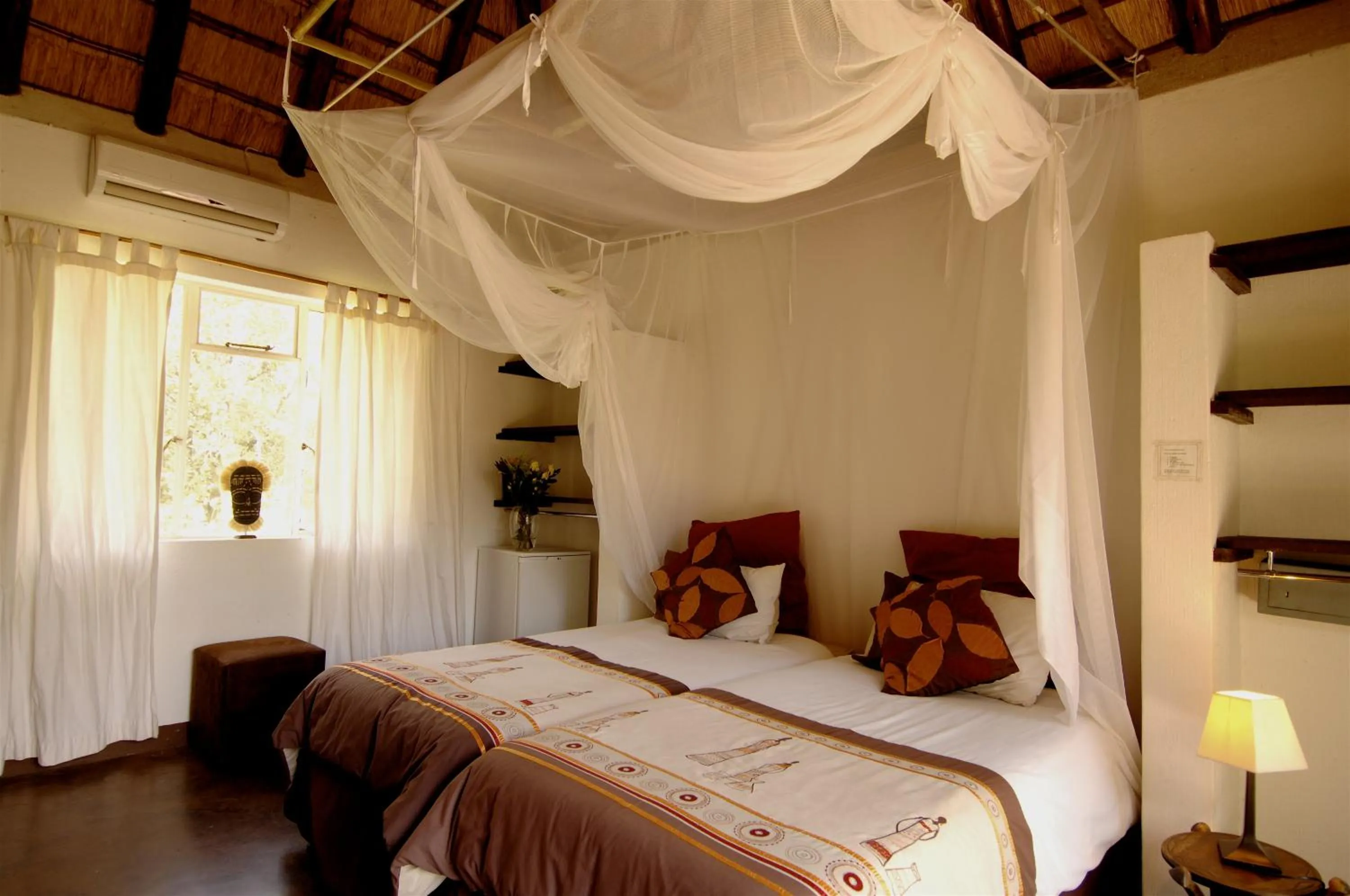 Bed in Normann Safari Bush Lodge