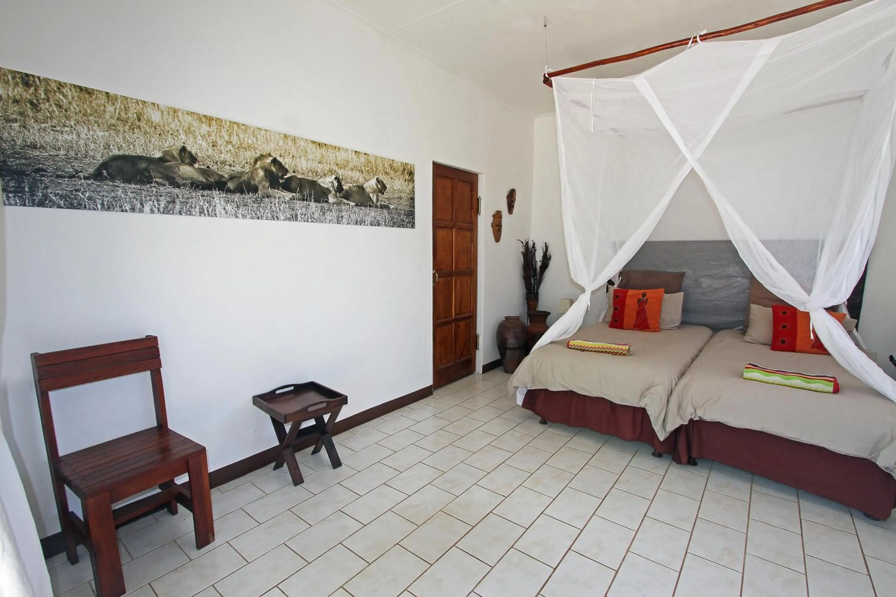 Bed in Normann Safari Bush Lodge