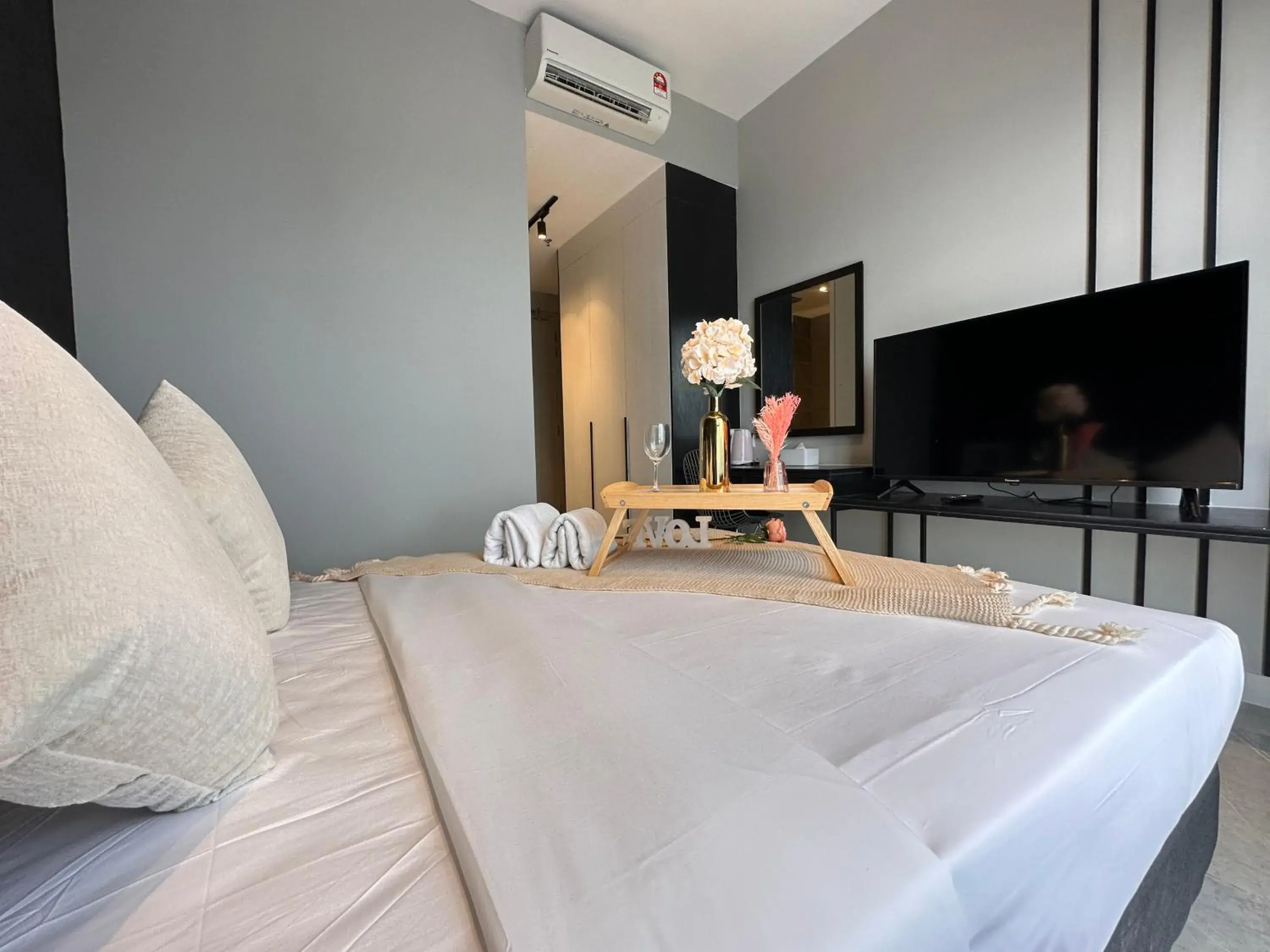 Communal lounge/ TV room, Bed in Axon Residence Bukit Bintang by Luna Communal lounge/ TV room, Bed in Axon Residence Bukit Bintang by Luna